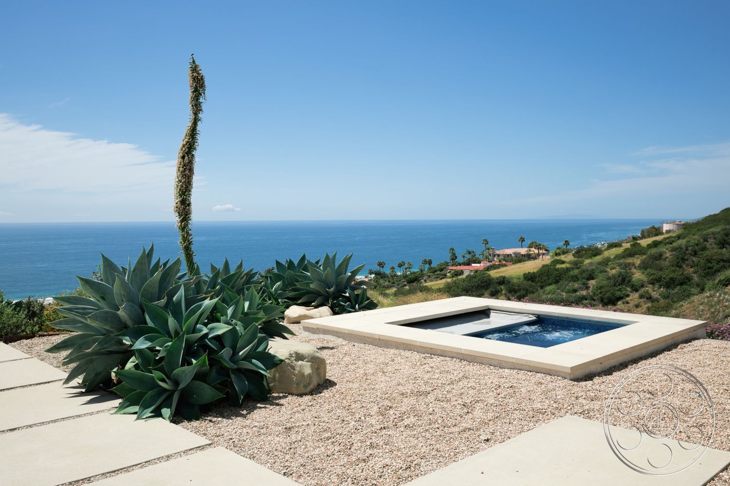 Modern 523 - exterior, natural stone accents, minimalist design, desert plants, succulent garden, hillside location, ocean view setting, rectangular spa, concrete spa border, pebbled landscaping