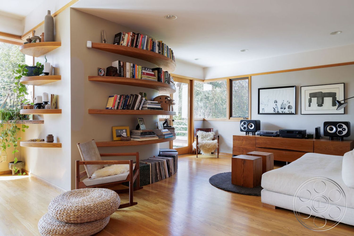 Mid-Century Exotic - natural light, minimalist design, textured area rug, modern furniture, glass windows, relaxed seating area, cozy reading nook, exposed wood ceiling beams, hardwood living room floors, light gray painted walls, wood floating shelves, walnut wood sideboard, contemporary art wall frames