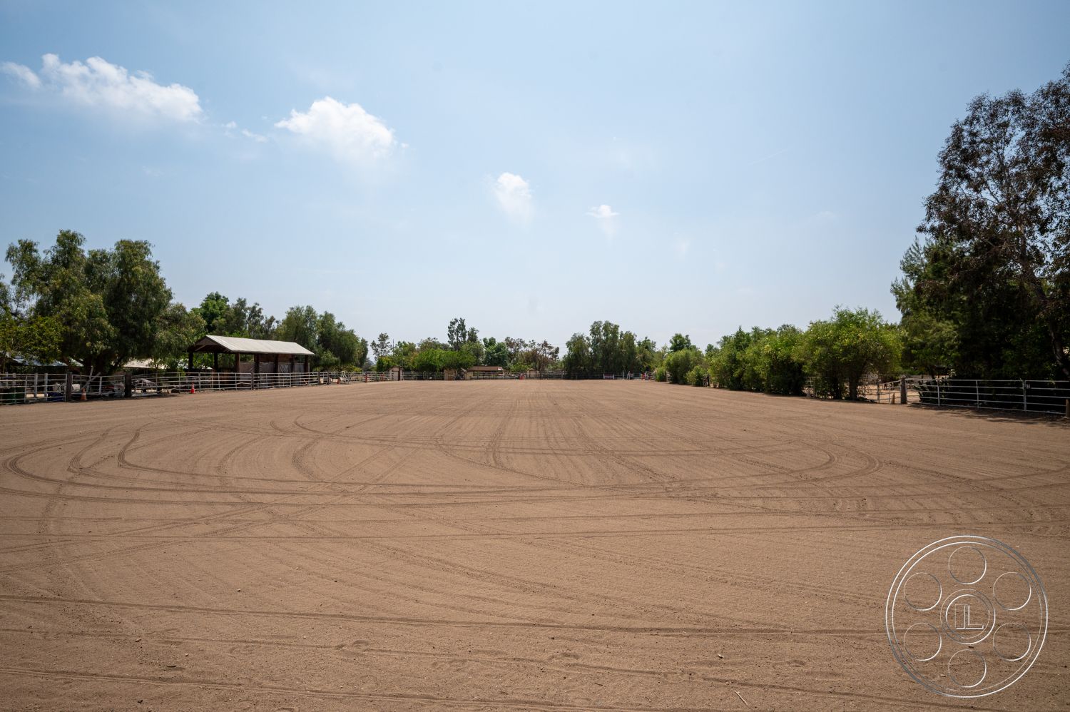 Ranch 6 - exterior, surrounding trees, metal fencing, open sky, stable structures, sand arena, equestrian riding arena, dirt footing, outdoor riding space