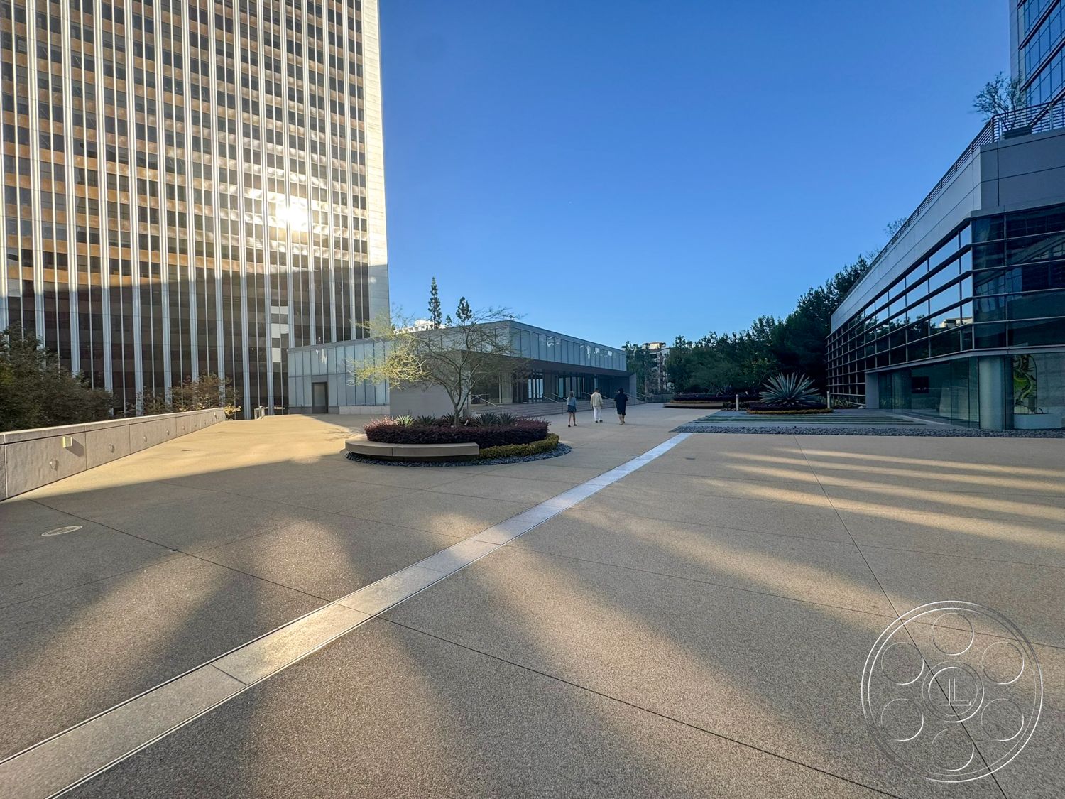 Ave Of The Stars - exterior, landscaped garden beds, glass curtain wall, concrete plaza flooring, modern landscape architecture, steel and glass architectural details, vertical striped glass windows, urban corporate campus, rectangular building forms, tree-lined walkways, minimalist outdoor seating areas