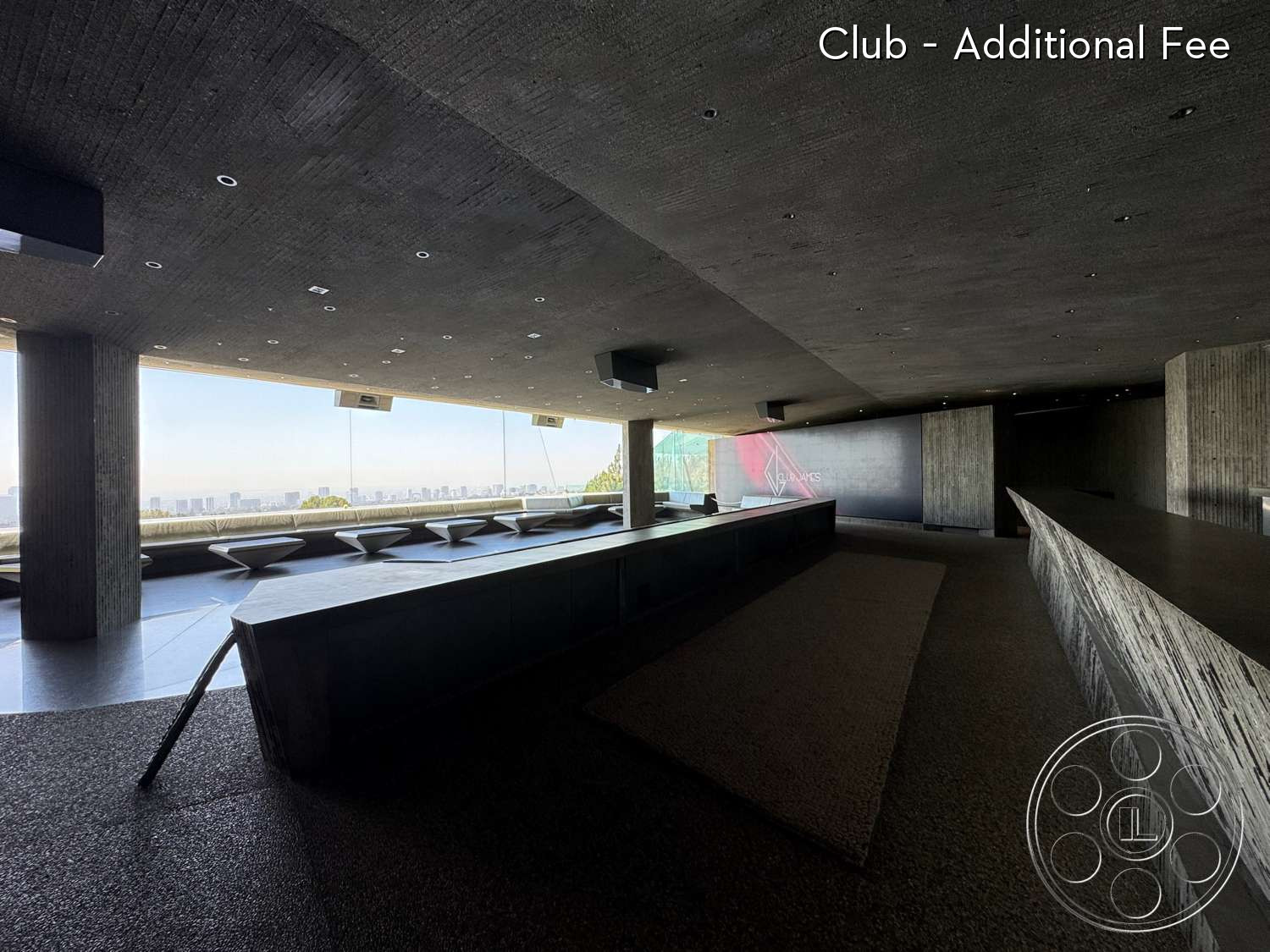 Goldstein House - concrete ceiling, polished concrete flooring, floor-to-ceiling windows, city skyline view, exposed concrete walls, minimalist design elements, open interior layout, architectural lighting fixtures, steel bar counter