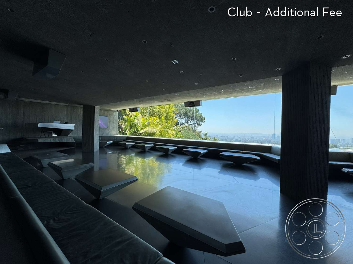Goldstein House - concrete walls, open floor plan, concrete ceiling, minimalist design, polished concrete flooring, floor-to-ceiling windows, panoramic city view, modern architectural style, angular furniture