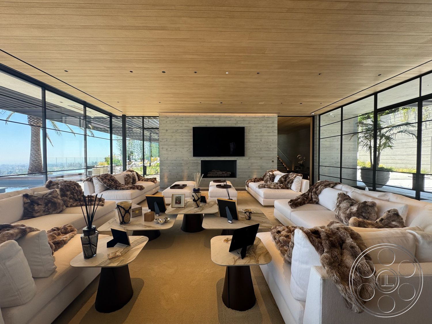 Star Villa - minimalist decor, open floor plan, contemporary art, floor-to-ceiling windows, textured throw pillows, modern fireplace, beige area rug, palm tree view, wood beam ceiling, concrete feature wall, glass balcony railing, white upholstered sectional sofa, marble side tables