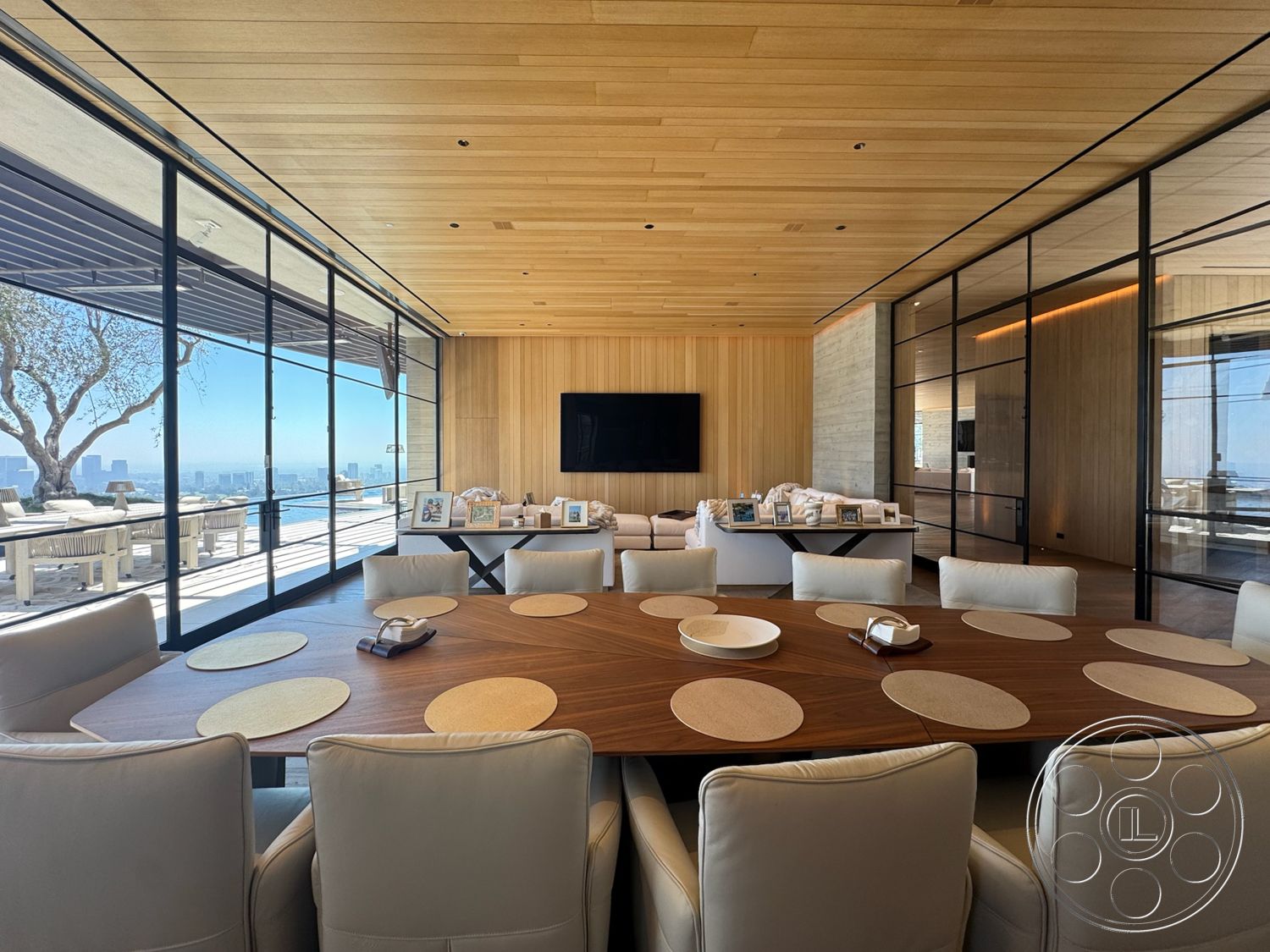 Star Villa - minimalist decor, open floor plan, upholstered dining chairs, wood panel ceiling, glass sliding doors, textured wall finish, floor-to-ceiling windows, city skyline view, dark wood dining table, concrete accent wall, modern living area