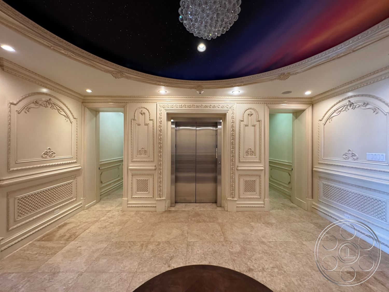 Beverly Compound - coffered ceiling, chandelier lighting, marble flooring, textured plaster walls, decorative wall sconces, panelled walls, ornate molding details, elevator shaft