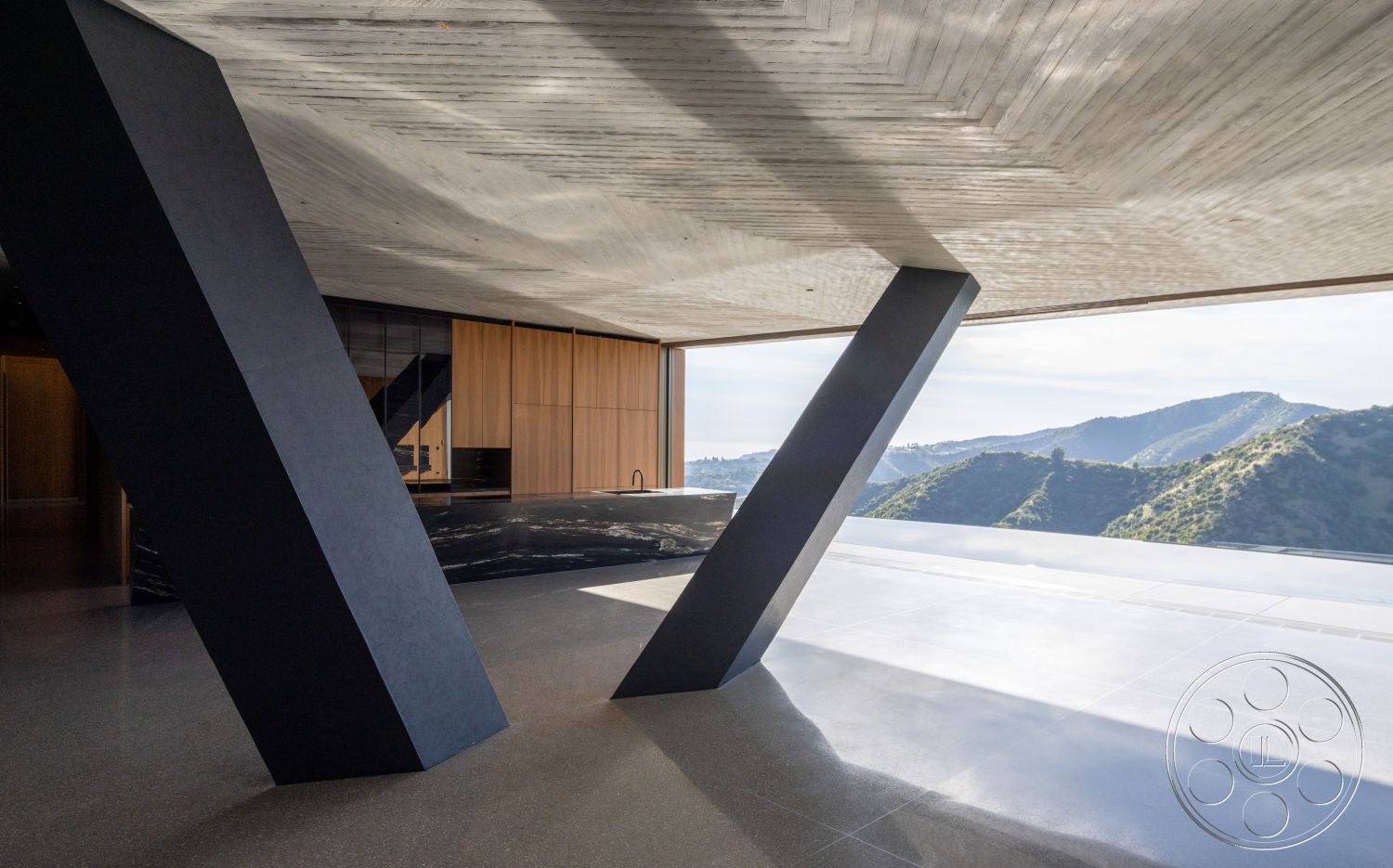 Modern 516 - dark wood cabinetry, polished concrete flooring, interior space, floor-to-ceiling windows, modern architectural style, exposed concrete ceiling, mountain view setting, black concrete structural beams