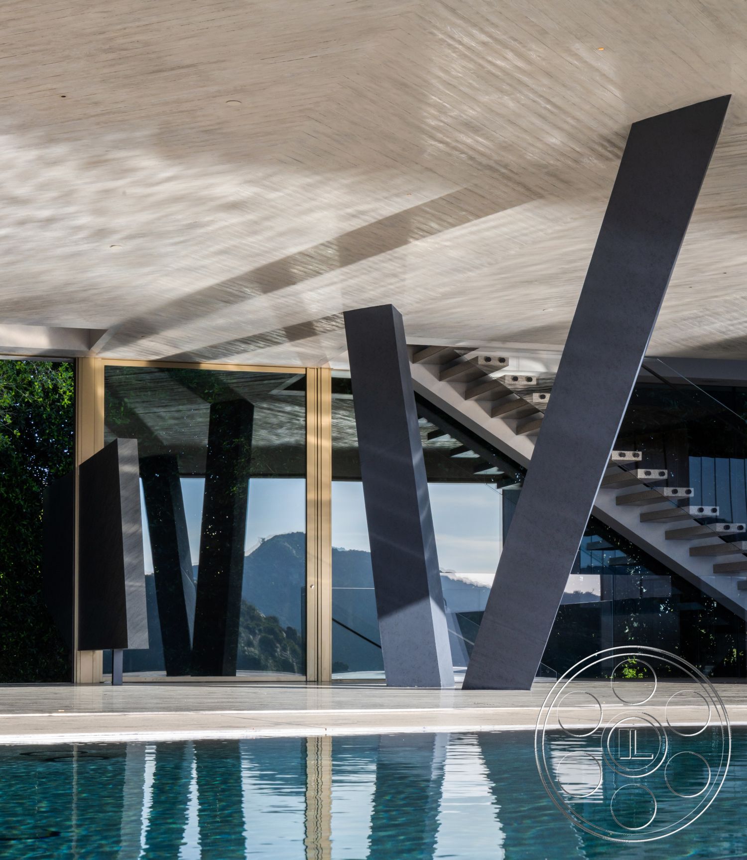 Modern 516 - exterior, open layout, glass sliding doors, landscape view, geometric shapes, modern architectural style, concrete ceiling, reflective pool surface, floating staircase, steel support columns