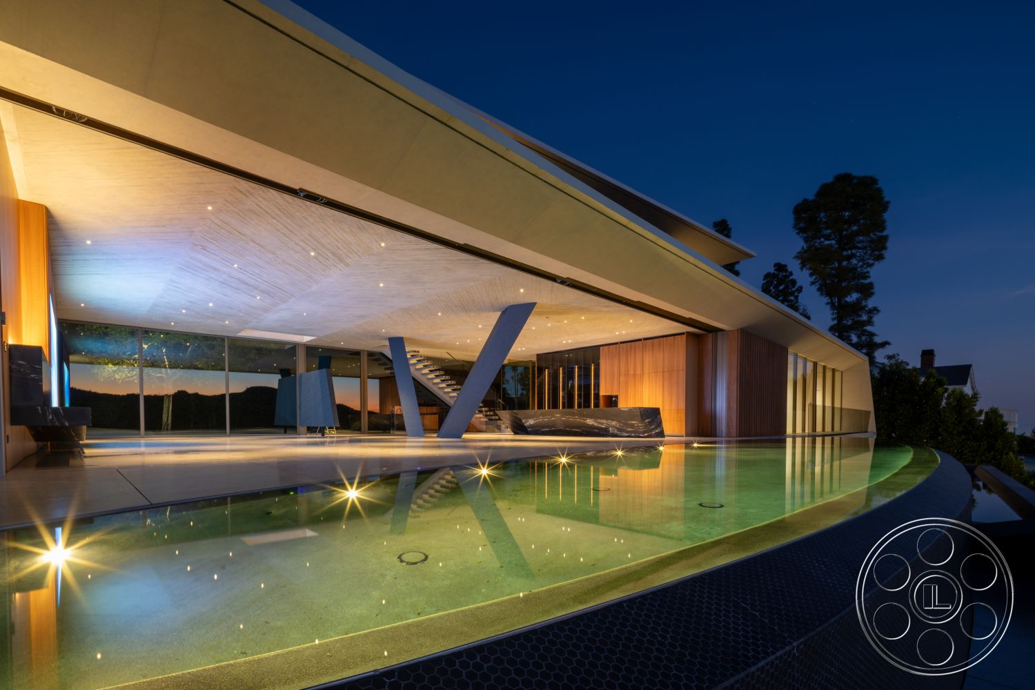 Modern 516 - recessed lighting, exterior, open floor plan, glass sliding doors, concrete walls, modern architectural style, infinity pool, rectangular pool, wood paneling accents, exposed wood ceiling, scenic mountain view, sleek landscaping