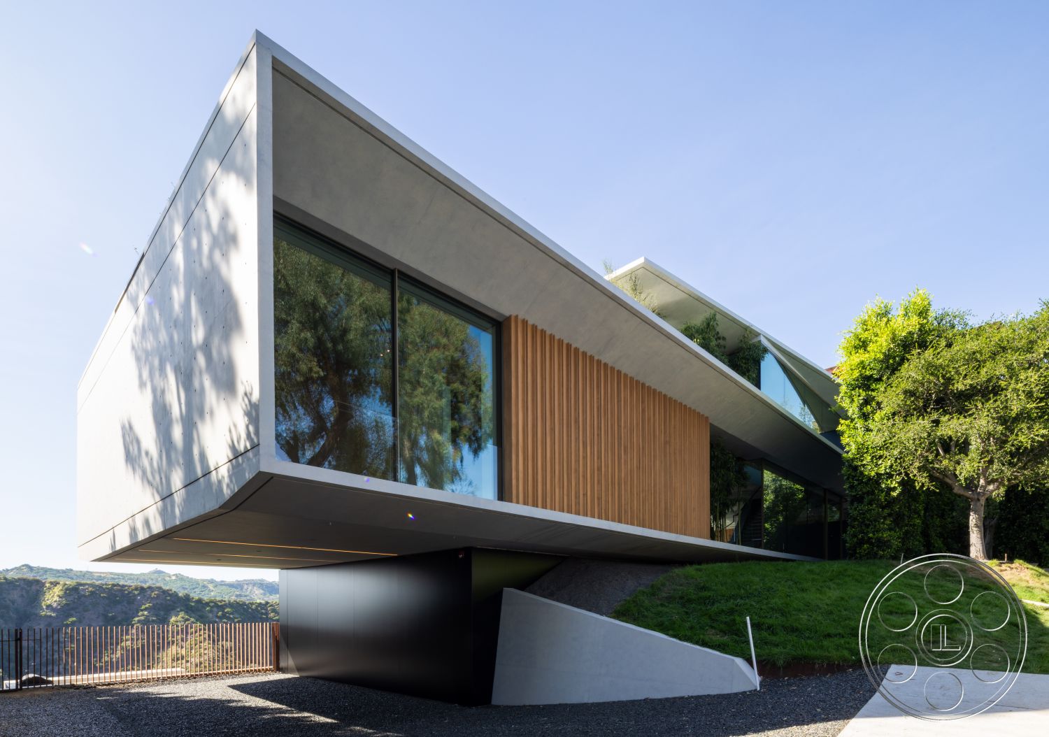 Modern 516 - exterior, modern architectural style, large floor-to-ceiling windows, flat roof design, landscaped garden area, concrete wall finishes, wood slat cladding, angular architectural forms, cantilevered structure, steel base frame