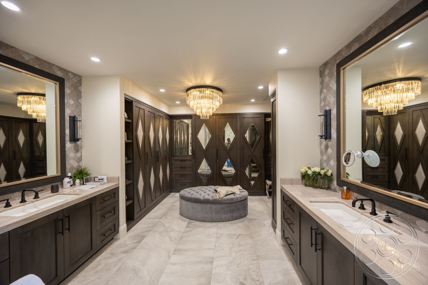 Hayden House - neutral color palette, modern design, textured wall tiles, spa-like atmosphere, vanity area, double sink vanity, custom cabinetry, chandelier lighting, exposed light fixtures, luxury bathroom, large wall mirrors, marble bathroom flooring, quartz bathroom countertops, built-in closet system