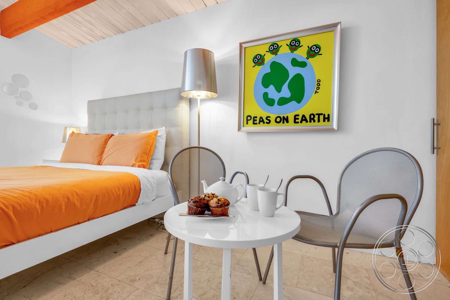 Palm Springs 76 - minimalist decor, framed wall art, marble floor, metal dining chairs, wood beam ceiling, contemporary bedroom design, white painted walls, orange bedding sets, tufted headboard bed, round white accent table