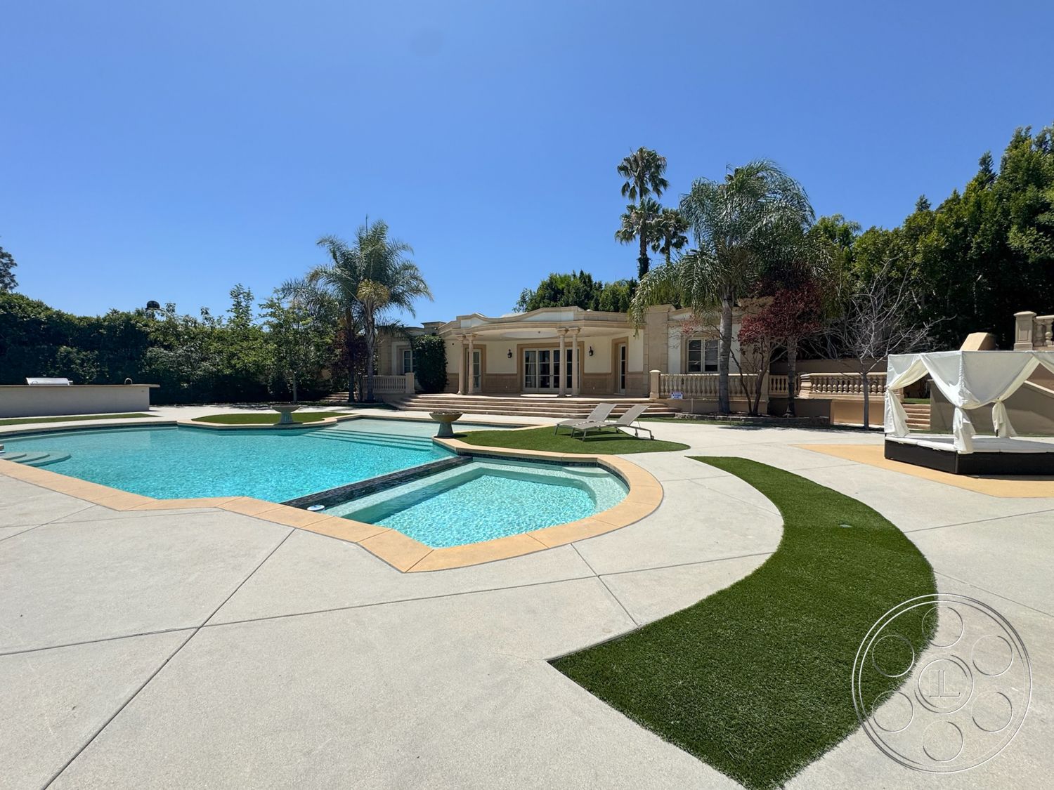Tiffany Estate - exterior, artificial grass, modern architectural style, deck area, rectangular pool, two-story home, landscaped garden area, concrete patio flooring, concrete pool border, paver stone steps
