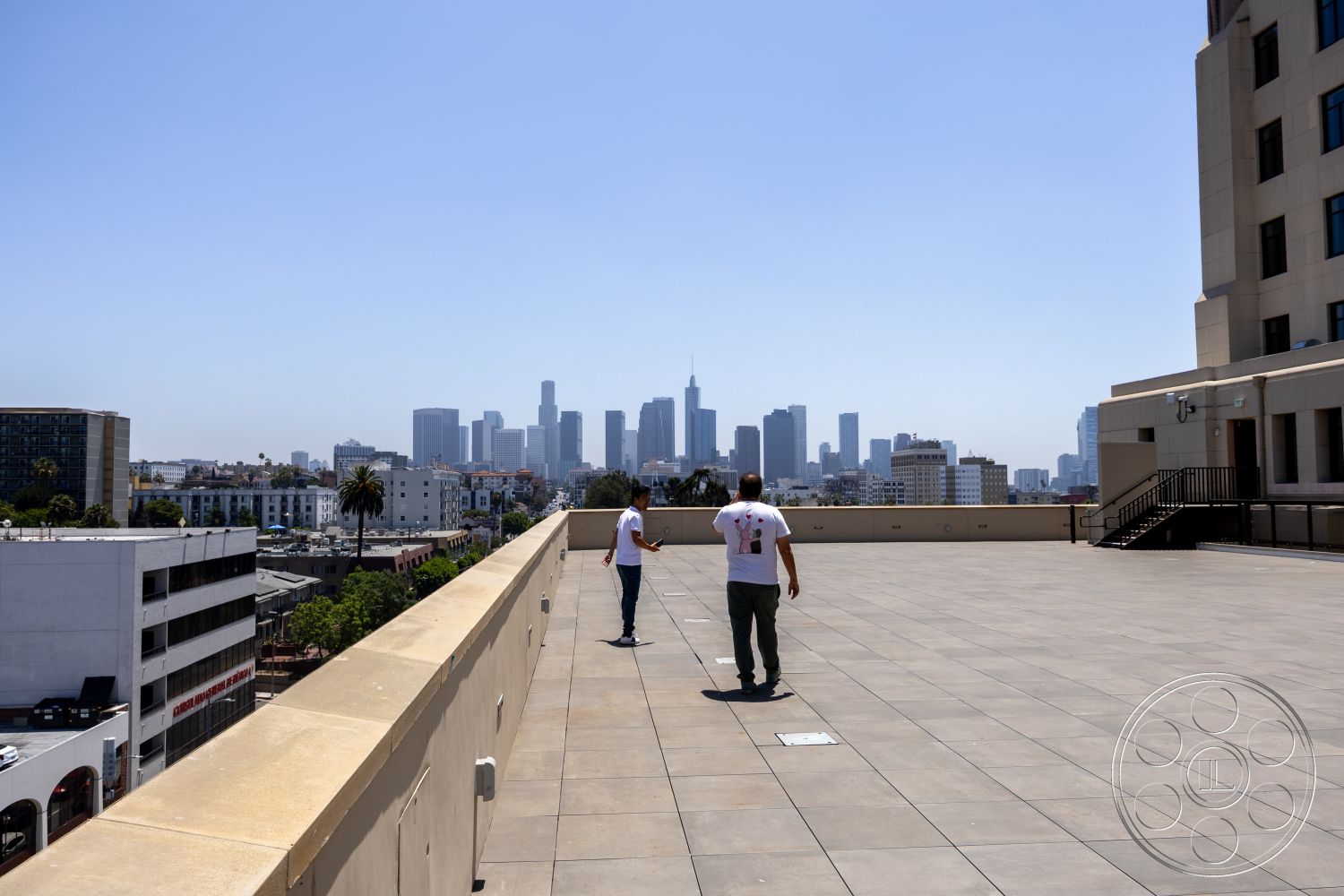 The Plaza - exterior, seating area, urban setting, city skyline view, railings, paved surface, flat roof structure, rectangular rooftop layout, concrete rooftop terrace, spacious open area