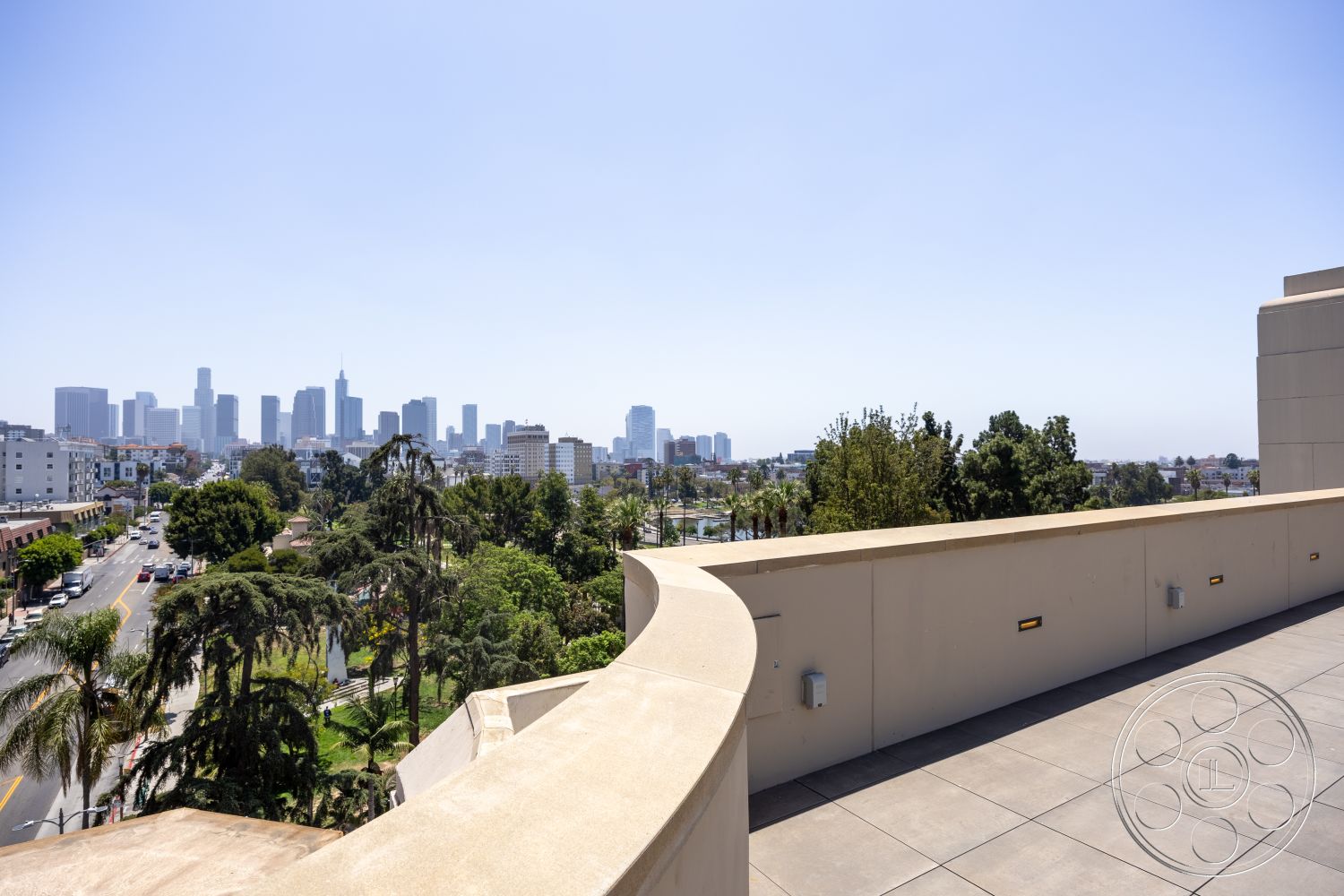 The Plaza - exterior, surrounding greenery, urban rooftop, modern architectural style, city skyline view, concrete terrace flooring, curved terrace edge