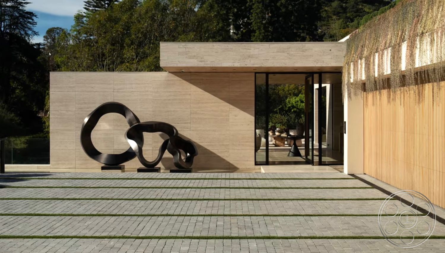 Chalon Estate - exterior, flat roof, paver driveway, landscaped garden view, geometric design, glass entry doors, horizontal wood slat wall, metal sculpture, stone facade wall, striped grass accents