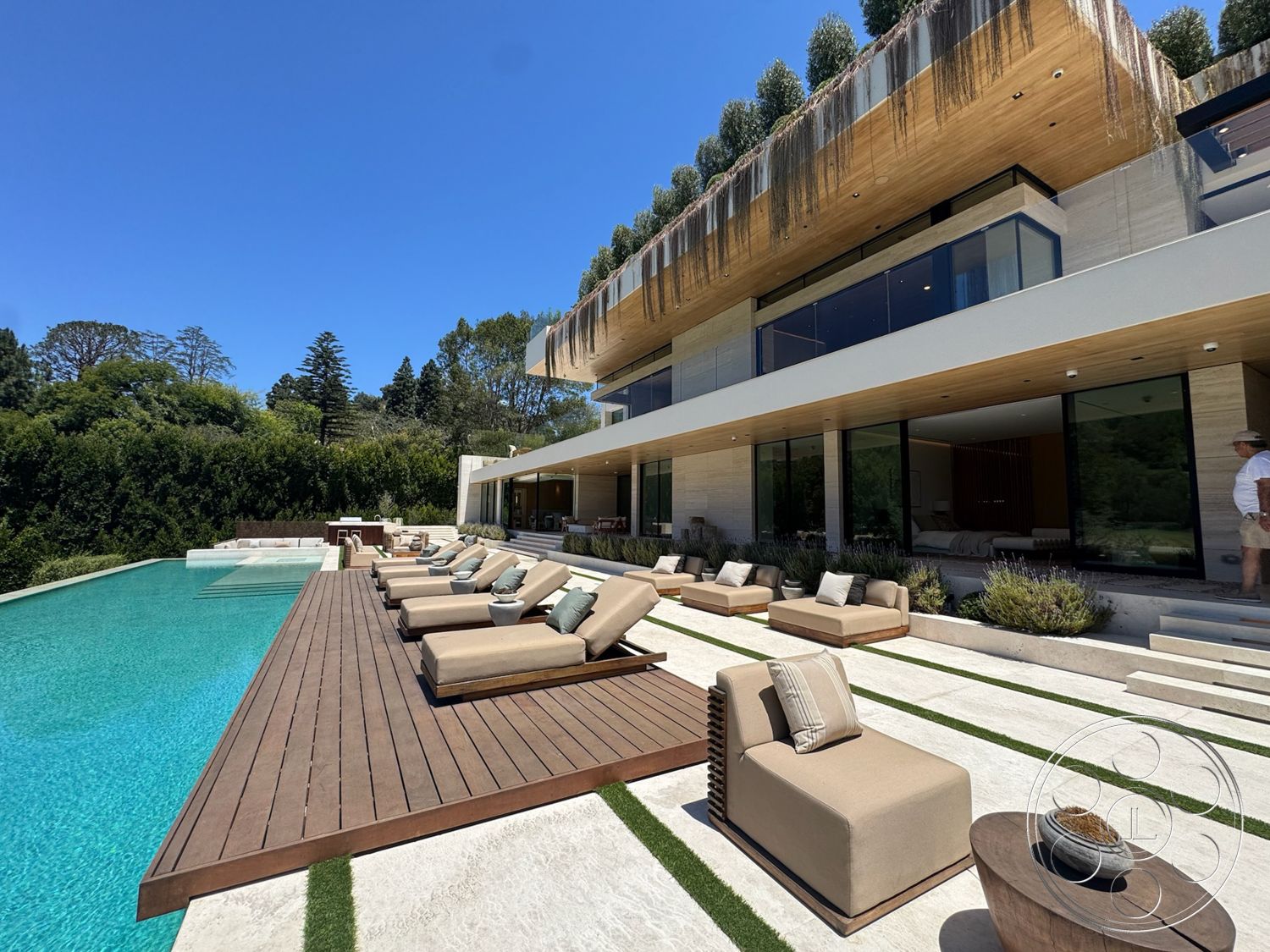 Chalon Estate - exterior, landscaped garden, open floor plan, glass sliding doors, modern architectural style, infinity pool, natural stone wall, concrete terrace, stainless steel railing, connected indoor-outdoor living, residential pool area, wood deck flooring, stone patio flooring, vertical garden wall, oversized lounge chairs