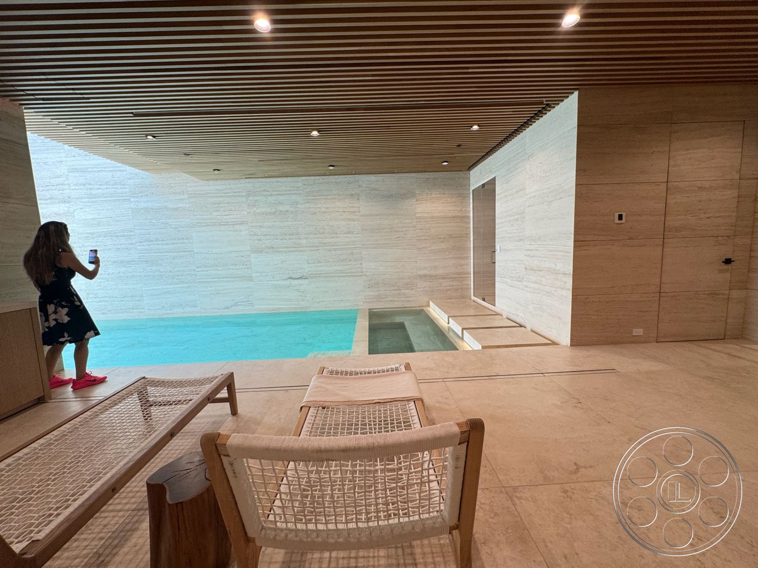 Chalon Estate - natural light, minimalist design, modern aesthetic, relaxation area, textured plaster walls, built-in seating, rectangular pool, wood beam ceiling, marble pool deck, concrete swimming pool, stone wall panels, fine wood furniture