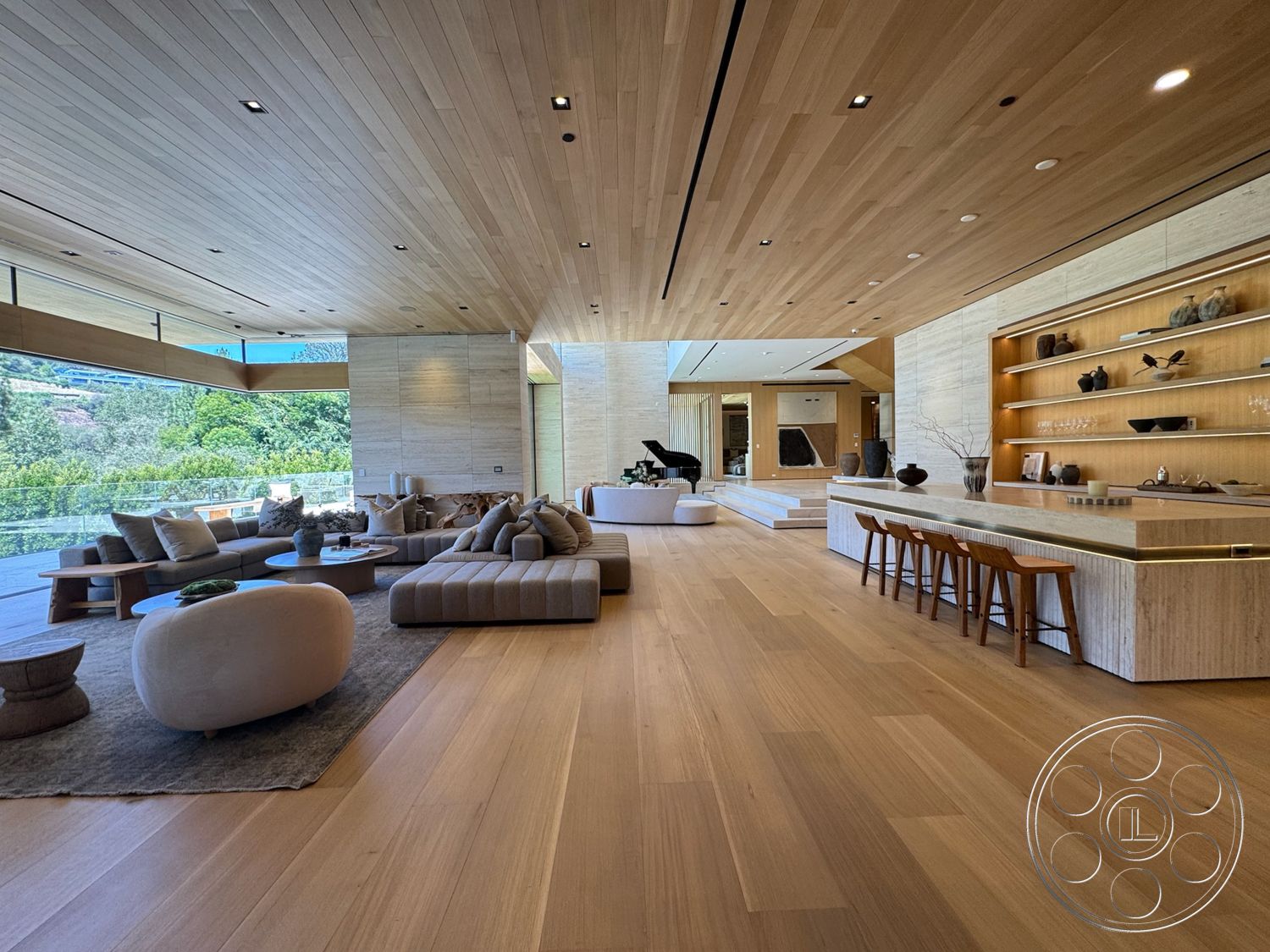 Chalon Estate - natural light, hardwood flooring, exterior, minimalist design, wooden bar stools, modern furniture, textured accent wall, greenery view, glass railing, floor-to-ceiling windows, contemporary architecture, indoor-outdoor connection, luxury interior, stone feature wall, open concept living area, lounge seating area, engineered wood ceiling, kitchen with bar seating