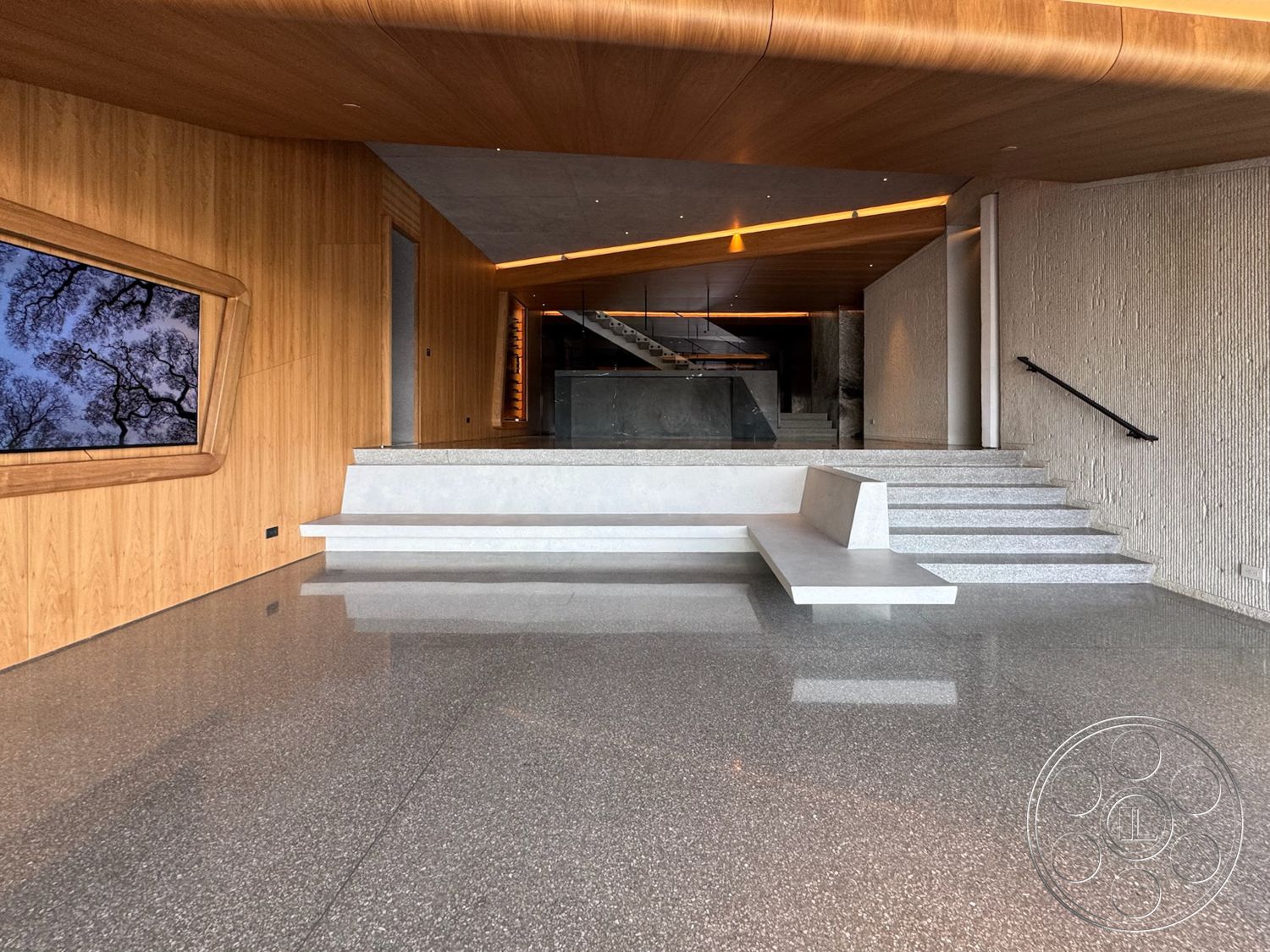 Modern 516 - ambient lighting, floor-to-ceiling windows, steel railing, exposed concrete ceiling, polished terrazzo floor, open layout design, wood paneling walls, floating concrete steps, angular bench seating