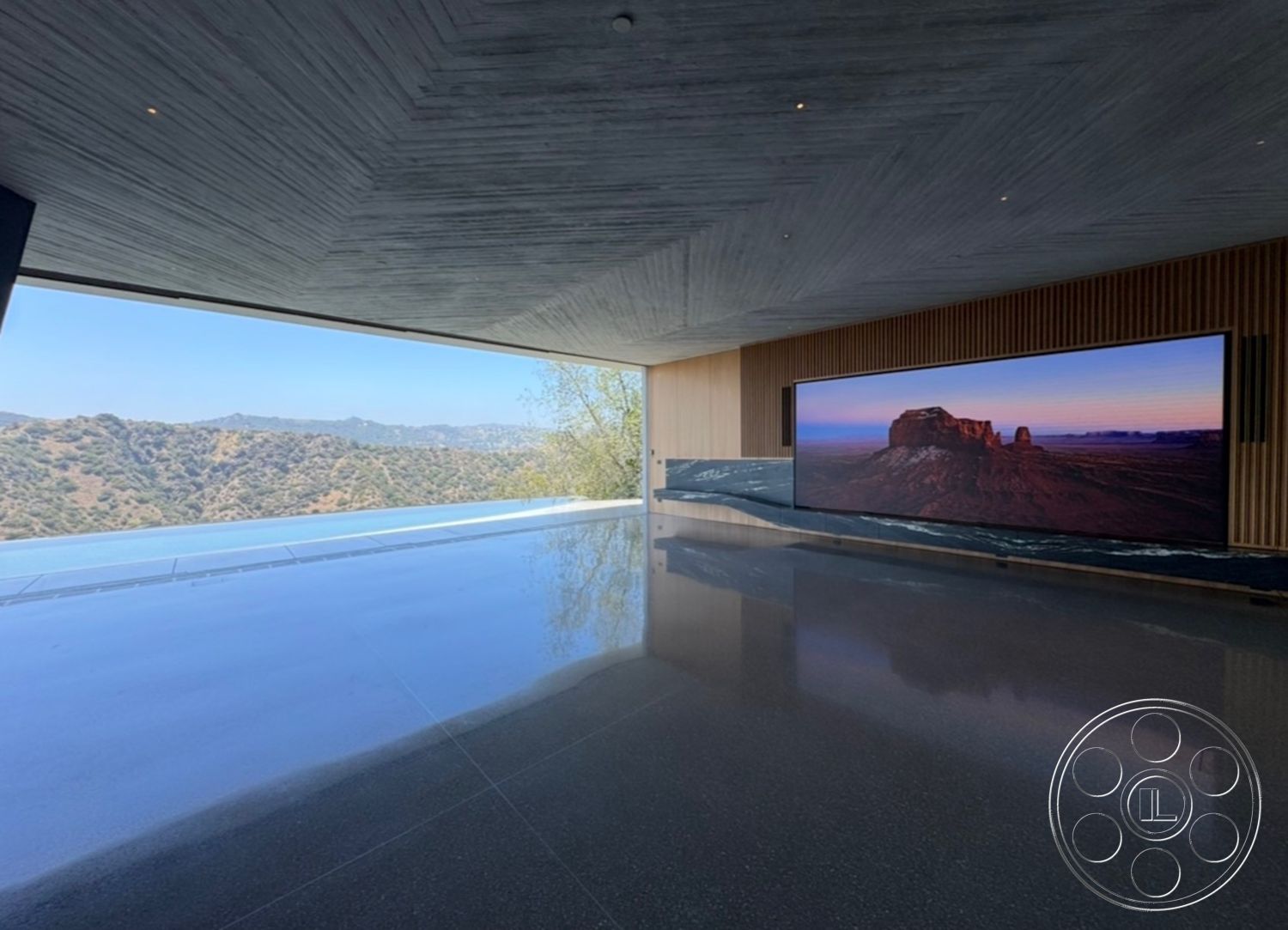 Modern 516 - polished concrete flooring, floor-to-ceiling windows, mountain view, exposed concrete ceiling, minimalist interior design, wood panel accent wall, rectangular open floor plan