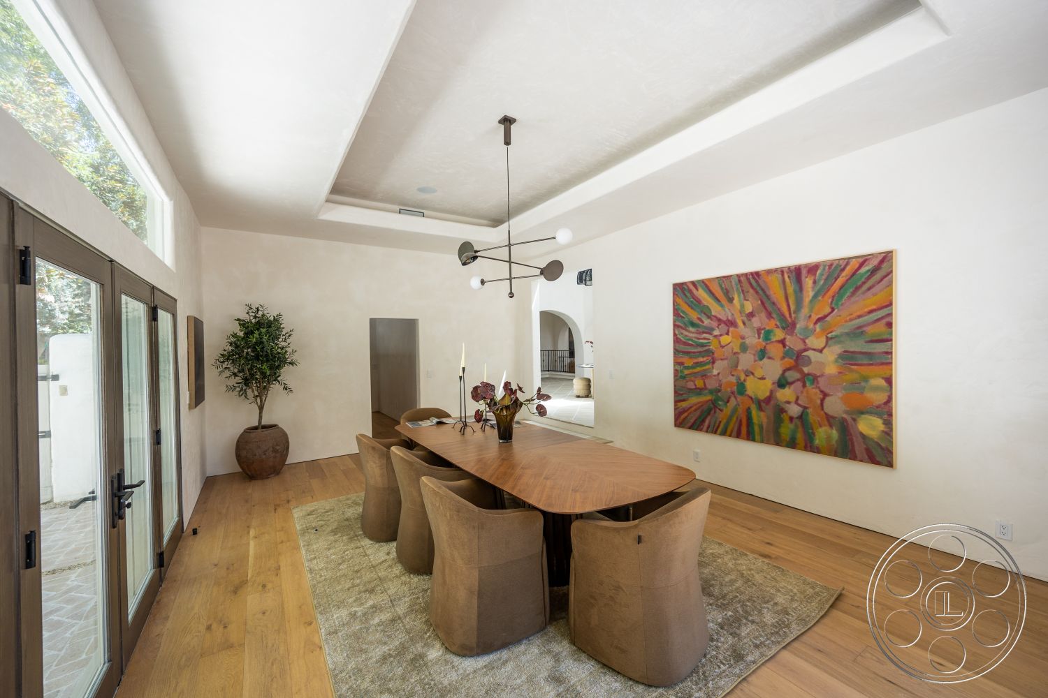 Medit 168 - decorative vase, indoor plant, upholstered dining chairs, large glass doors, artwork on wall, textured plaster walls, rectangular dining table, area rug under dining table, ambient ceiling lighting, hardwood dining room floors, coffered dining room ceiling