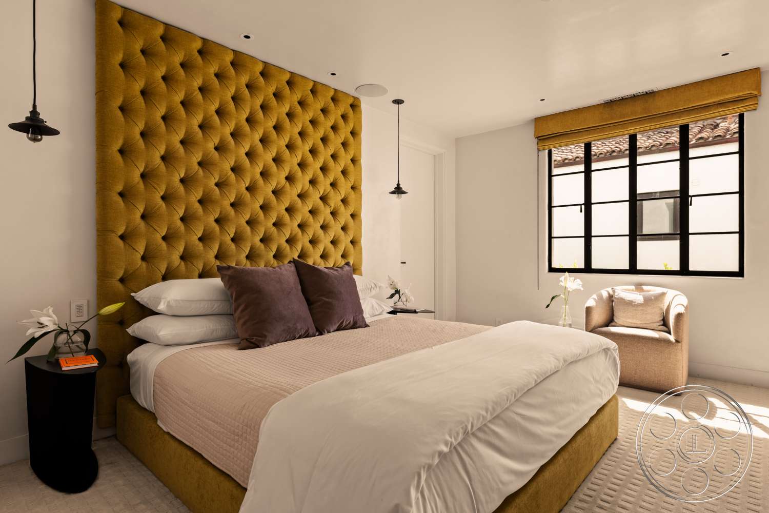 Beach 137 - pendant lighting, soft area rug, white bedding, king-sized bed, decorative throw pillows, modern minimalist design, yellow window treatment, tufted velvet headboard, nightstand with black finish, woven fabric chair, black window frame