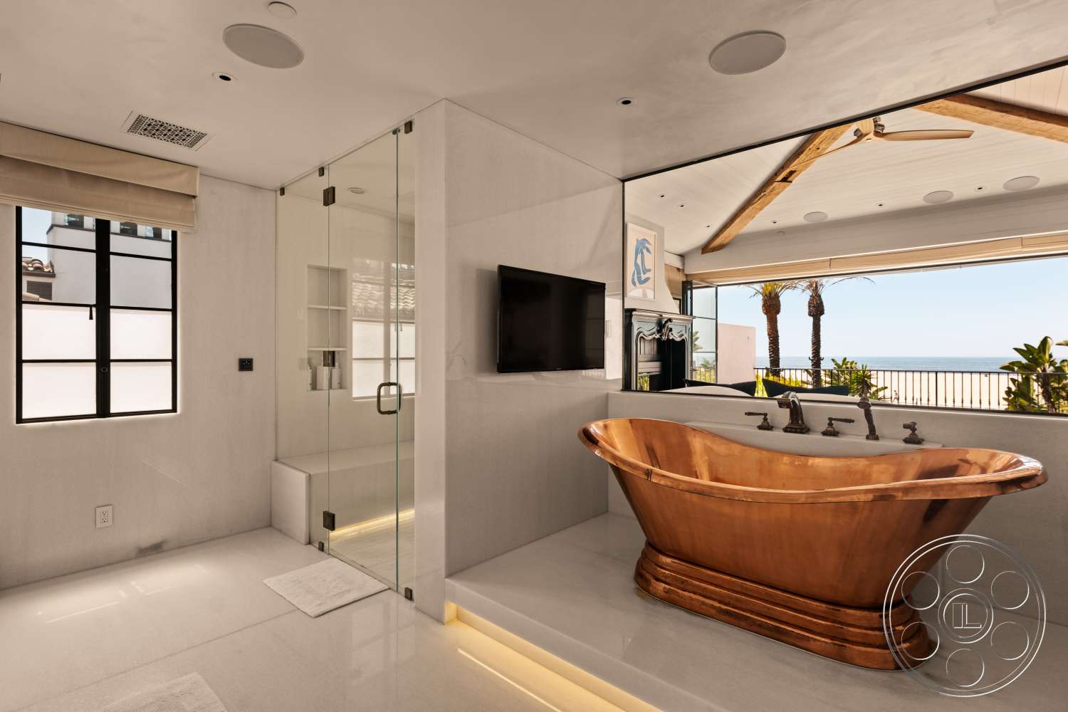 Beach 137 - glass shower enclosure, floor-to-ceiling windows, polished marble flooring, palm tree view, exposed wood ceiling beams, modern bathroom design, marble bathroom walls, luxurious spa-like atmosphere, oceanfront setting, copper freestanding bathtub