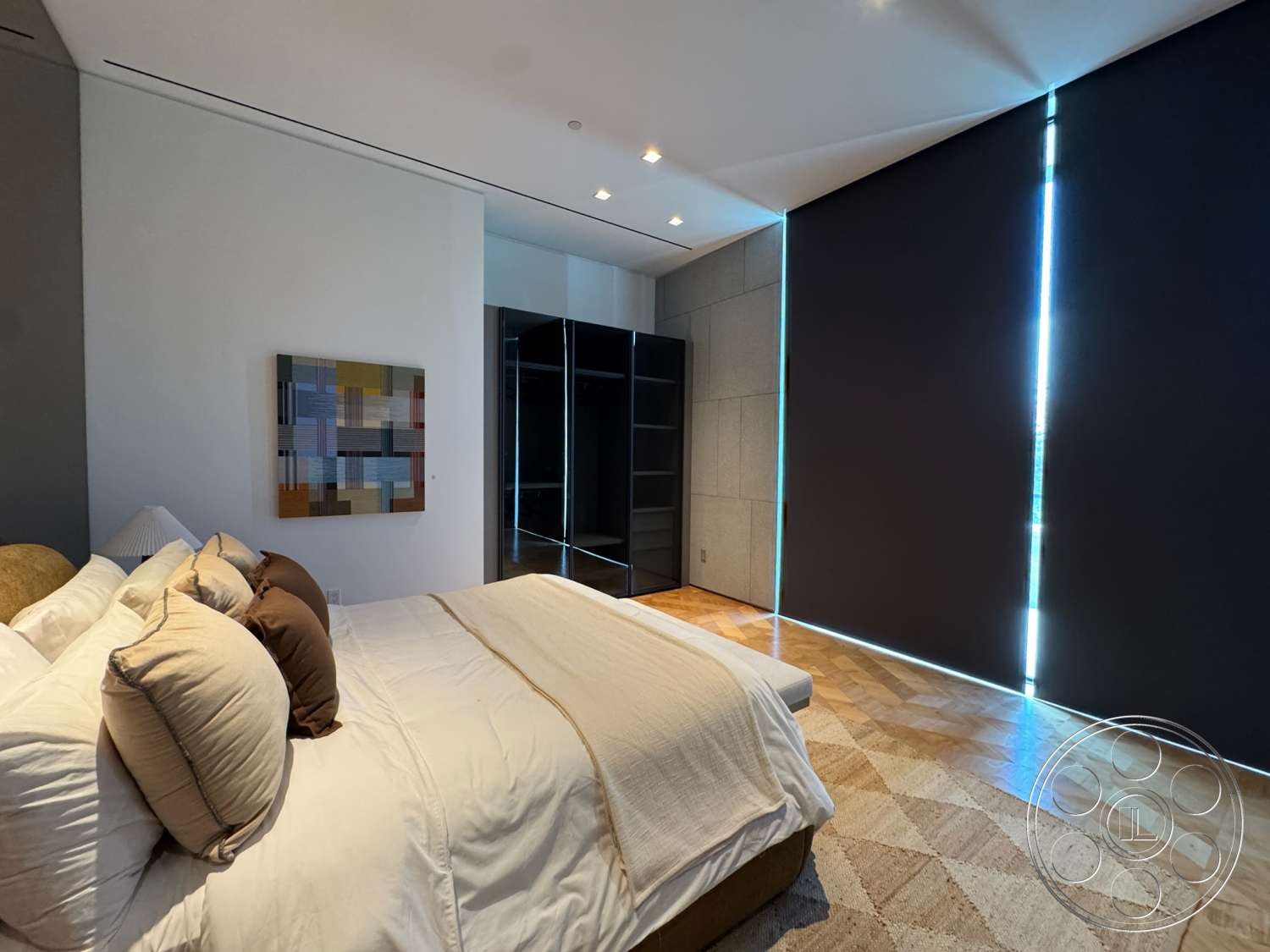 The Bellagio Estate - dark wood cabinetry, contemporary artwork, floor-to-ceiling windows, plush upholstered bed, textured plaster walls, decorative throw pillows, parquet wood flooring, blackout roller shades