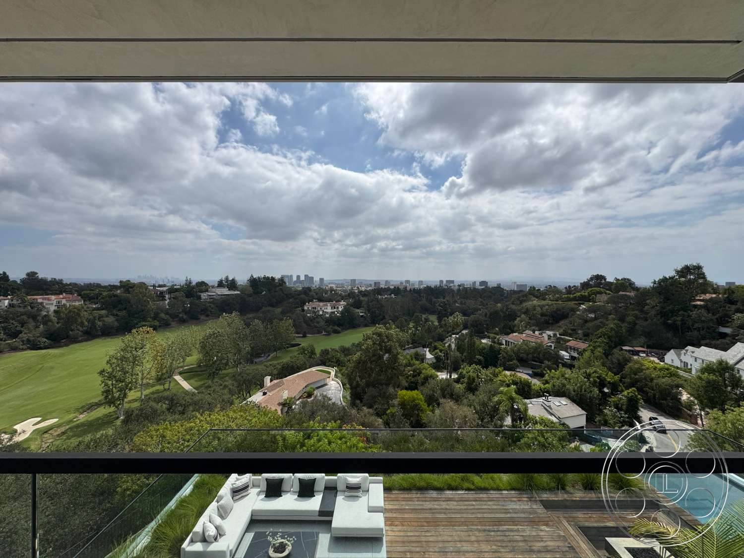The Bellagio Estate - exterior, lush greenery, landscape view, contemporary architecture, urban skyline view, spacious terrace, hillside location, modern outdoor seating area, wood deck flooring, glass railing balcony