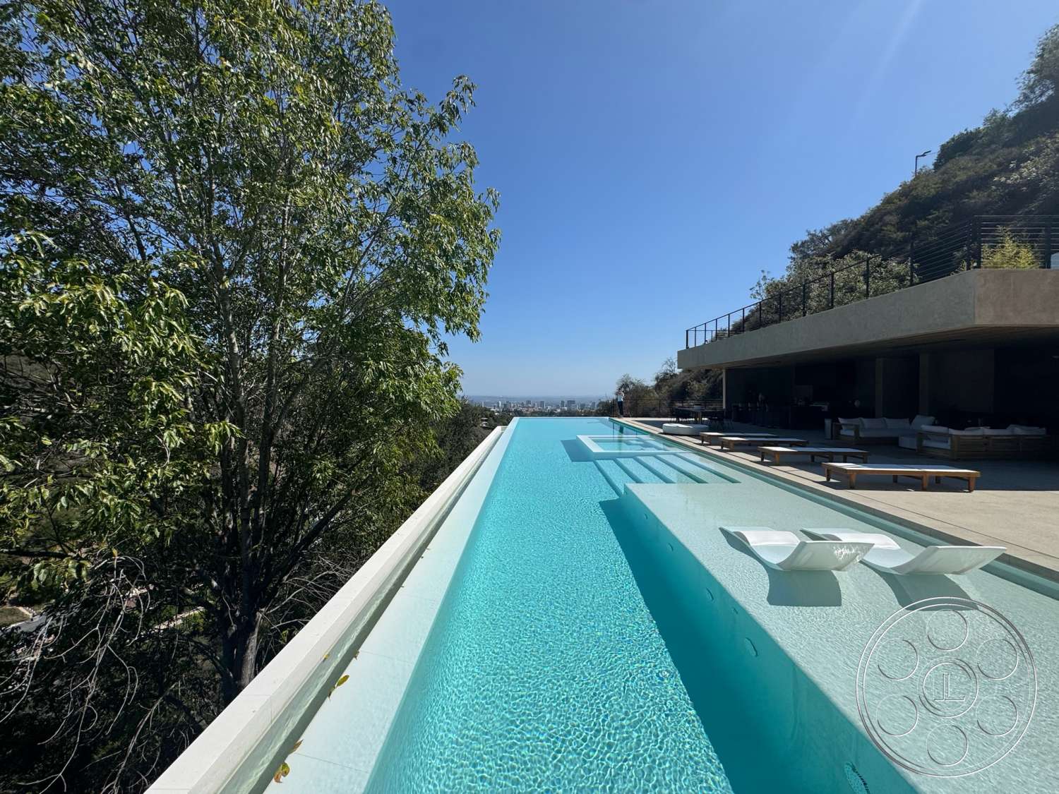 Modern 527 - outdoor seating area, landscaped greenery, floor-to-ceiling windows, minimalistic design, mountain view, open terrace, infinity pool, concrete pool deck, urban hillside location, concrete overhang, glass poolside loungers