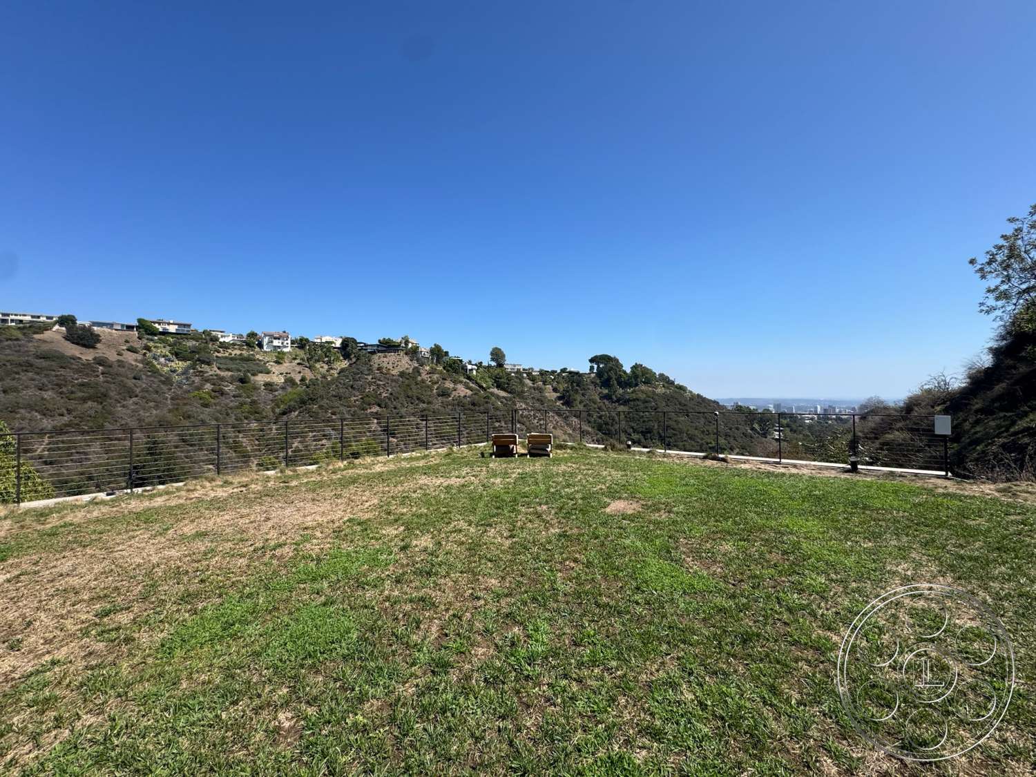 Modern 527 - exterior, patio area, metal fence, grass lawn, mountain backdrop, urban view, hillside location, landscape setting