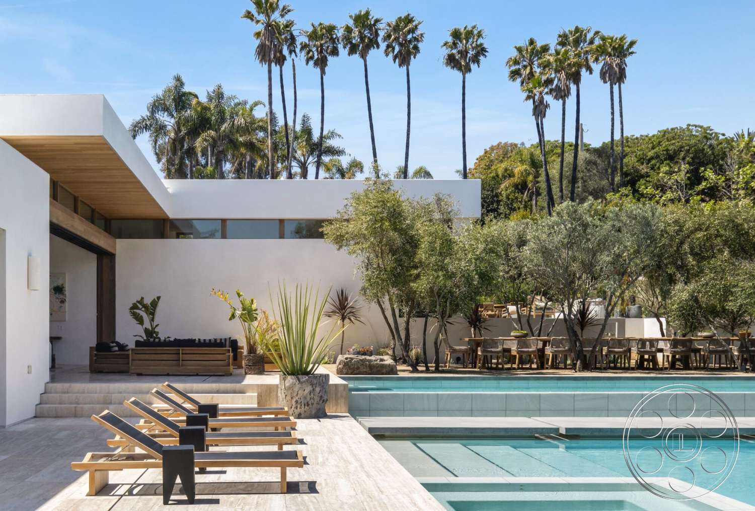 Modern 529 - exterior, white stucco walls, modern architecture, minimalist design, floor-to-ceiling windows, tropical landscaping, concrete pool deck, rectangular pool, wooden lounge chairs, flat roof design, wood beam ceiling, urban garden setting, natural stone patio flooring, palm tree surroundings, open outdoor dining area