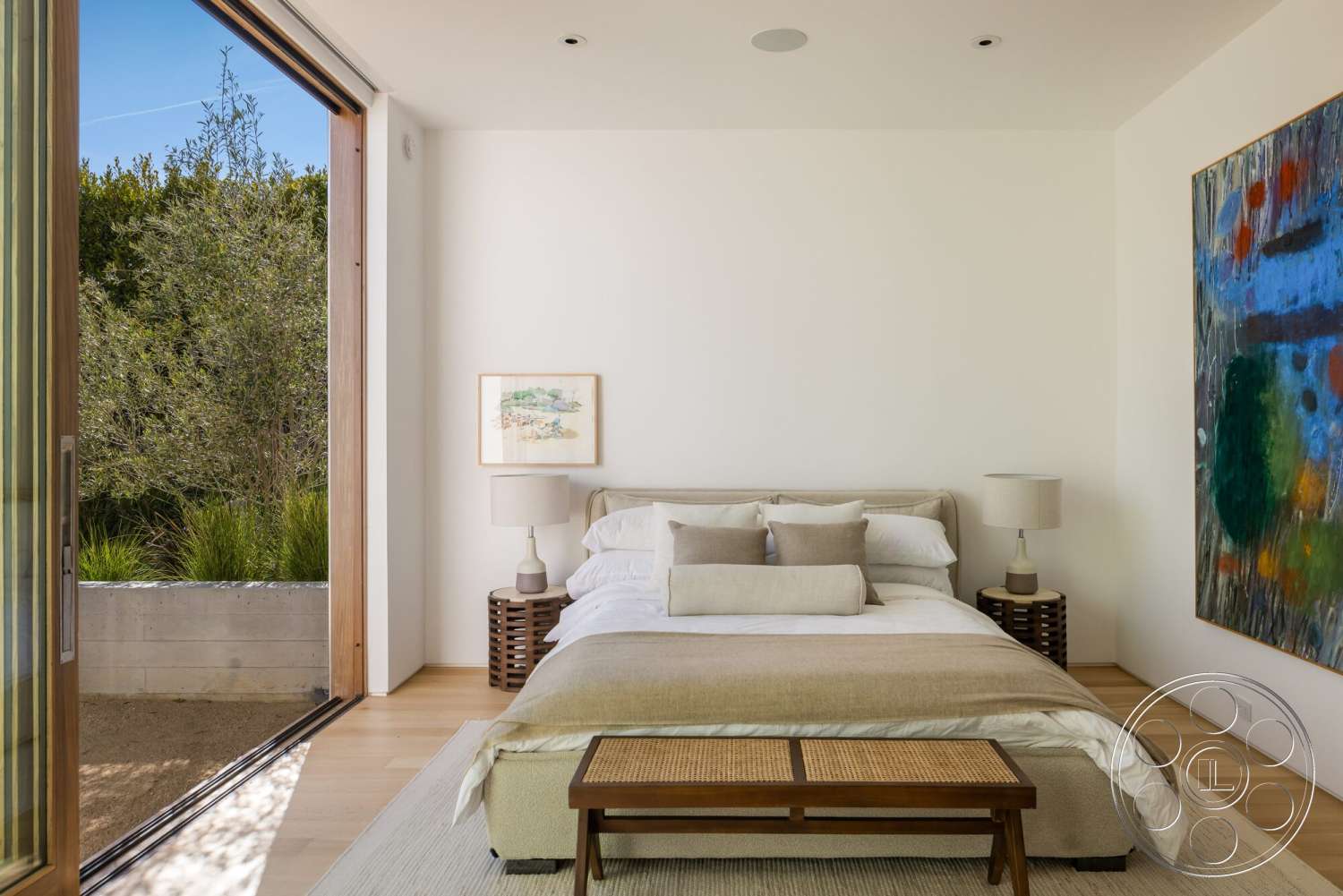 Modern 529 - textured area rug, decorative wall art, wooden bedside tables, hardwood bedroom floors, white painted walls, floor-to-ceiling glass doors, table lamps with fabric shades, upholstered bed frame, exposed concrete wall planter