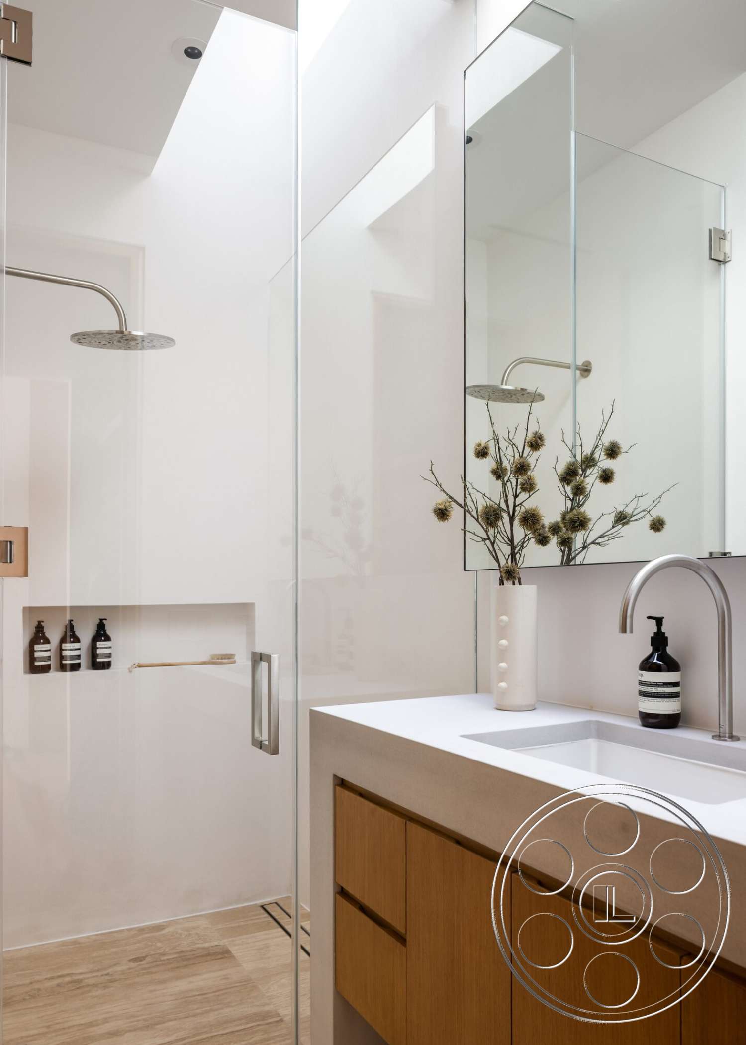 Modern 529 - neutral color palette, recessed lighting, minimalist design, decorative vase, glass shower enclosure, textured tile flooring, modern faucet, open shower design, mirrored bathroom wall, functional storage niche, wood bathroom cabinetry, concrete vanity countertop