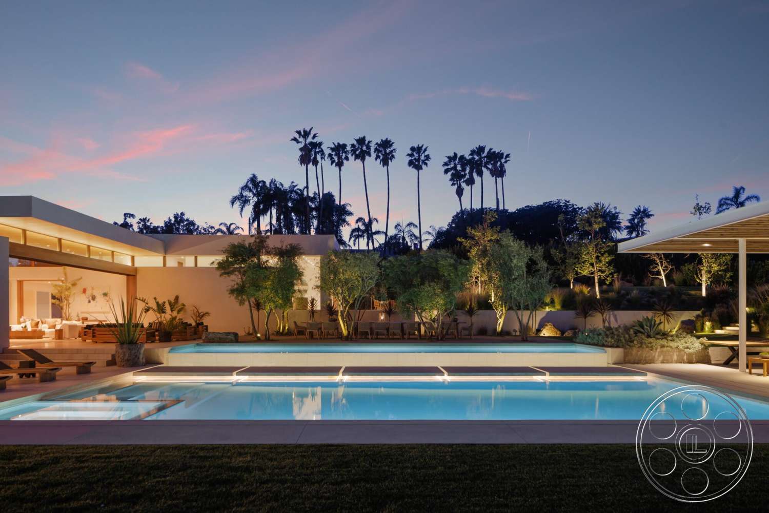 Modern 529 - exterior, minimalist design, sliding glass doors, textured concrete walls, rectangular swimming pool, modern architectural style, lush vegetation, outdoor dining space, concrete pool deck, landscaped garden area, open outdoor seating area, smooth concrete patio floor, palm tree skyline view, grainy stone garden accents, accent lighting features, soft evening lighting