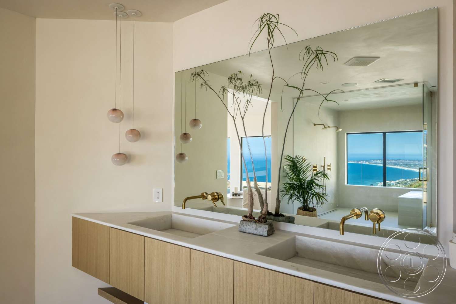 Modern 528 - neutral color palette, glass shower enclosure, floor-to-ceiling windows, interior bathroom, suspension pendant lighting, large wall mirror, floating wood cabinetry, marble bathroom sink countertop, polished chrome faucet fixtures, light beige plaster walls, modern tropical plant decor, oceanview