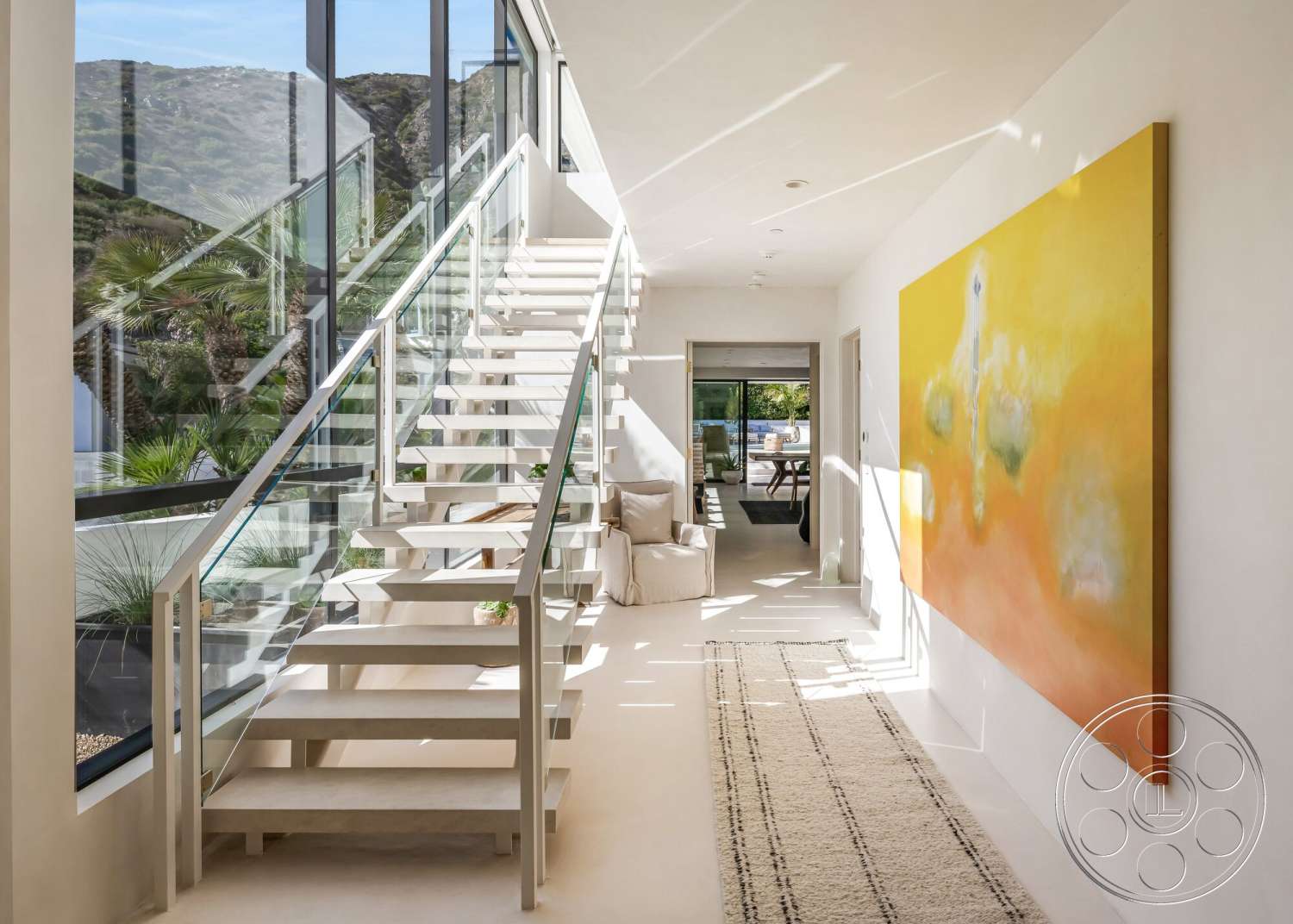 Modern 528 - minimalist design, natural lighting, open floor plan, plant accents, abstract wall art, modern architectural style, textured plaster walls, large floor-to-ceiling windows, floating staircase with glass railings, neutral colored flooring