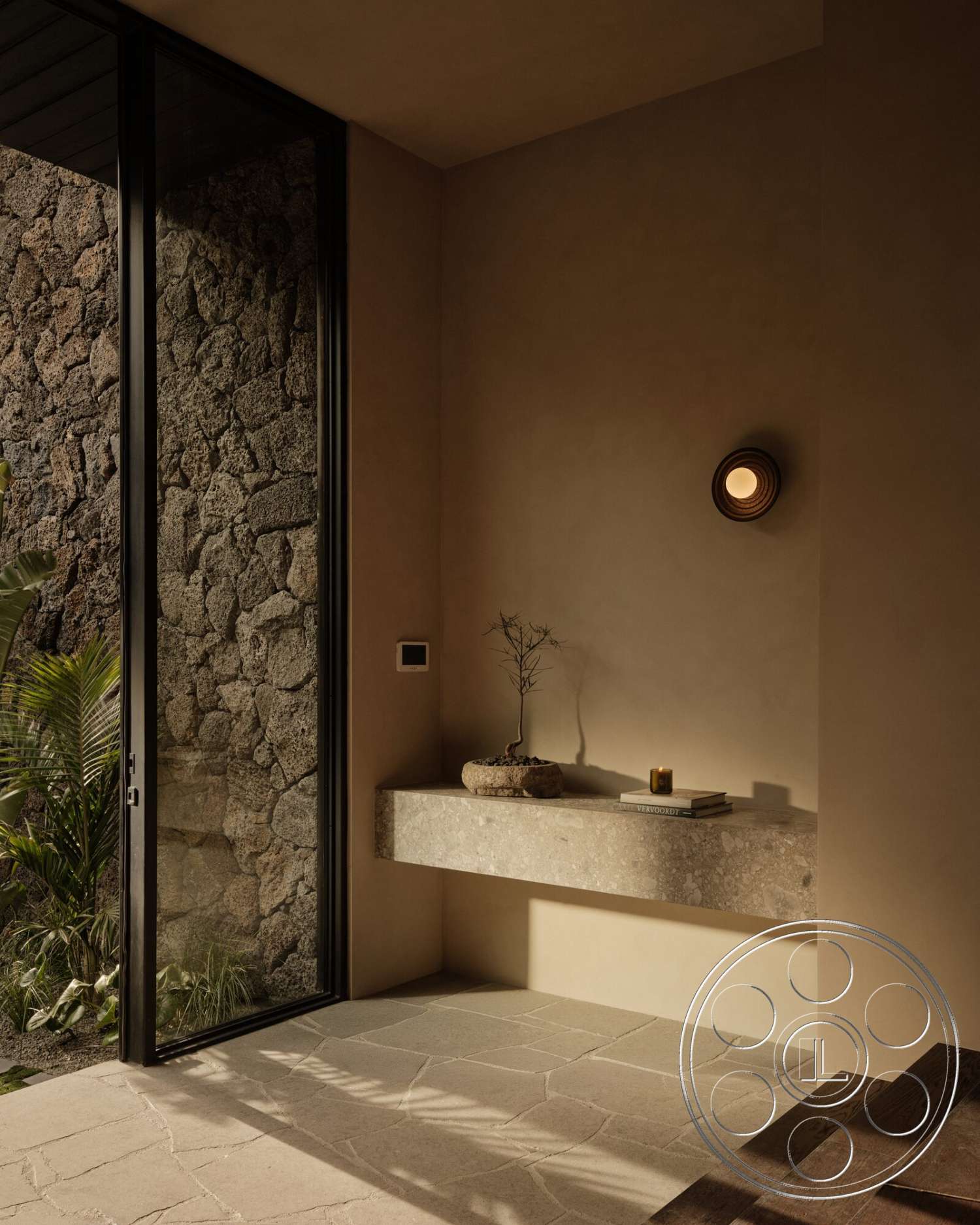 Modern 530 - exterior, minimalist design, open space layout, natural stone flooring, textured plaster walls, large glass door, concrete bench, mountain view setting, indoor plant accents, stone wall cladding, wall-mounted lighting fixture