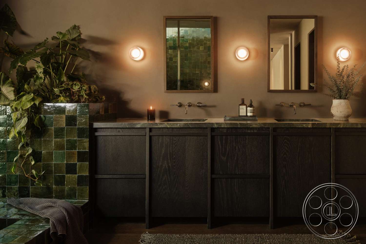 Modern 530 - marble countertop, large potted plants, framed wall mirrors, dark wood bathroom cabinets, vintage-style wall sconces, green glazed tile wall treatment, metal wall-mounted faucets, textured gray bath mat, soft woven fabric blanket