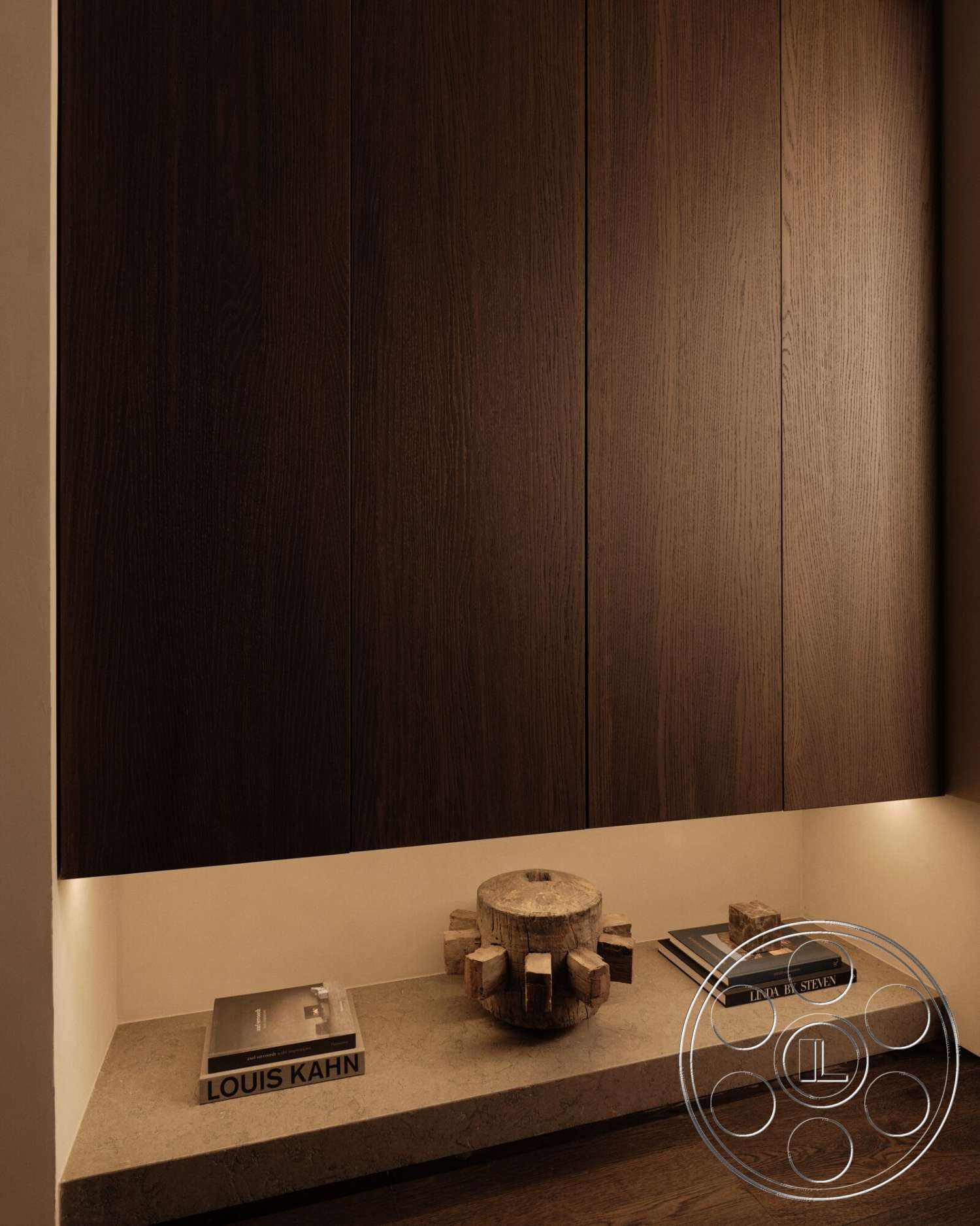 Modern 530 - minimalist design, ambient lighting, warm color palette, textured plaster walls, dark wood paneling, concrete shelf, books on display, natural wood accent
