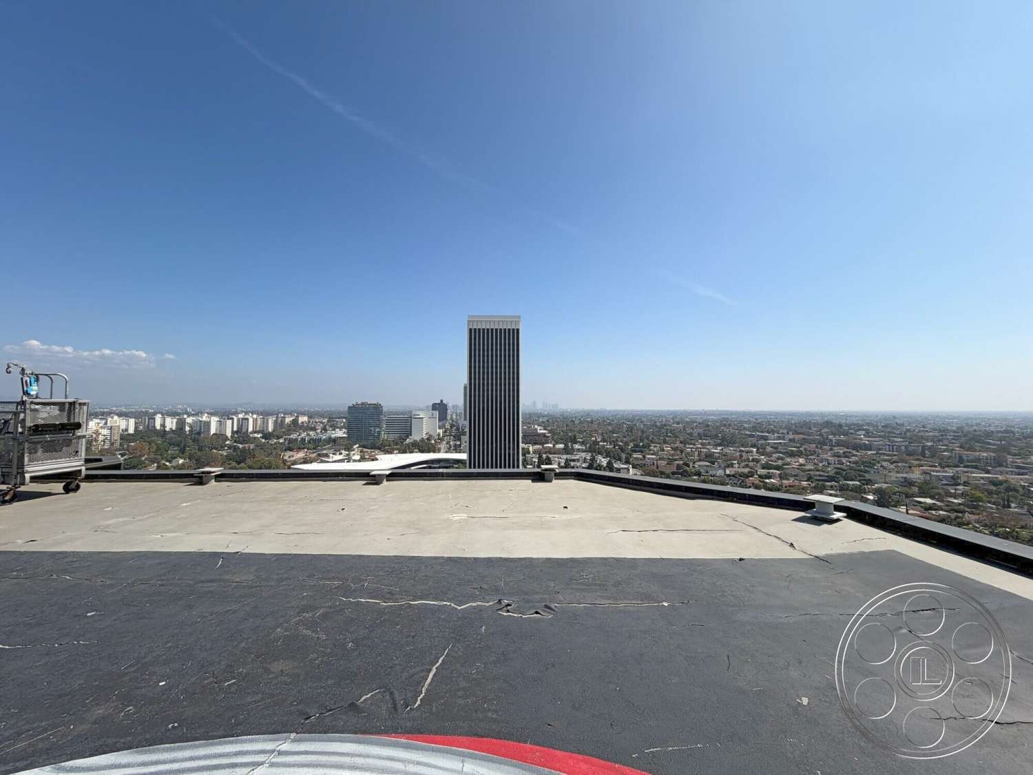 Wilshire Penthouse - exterior, roof terrace, urban environment, city skyline view, flat roof design, concrete roof