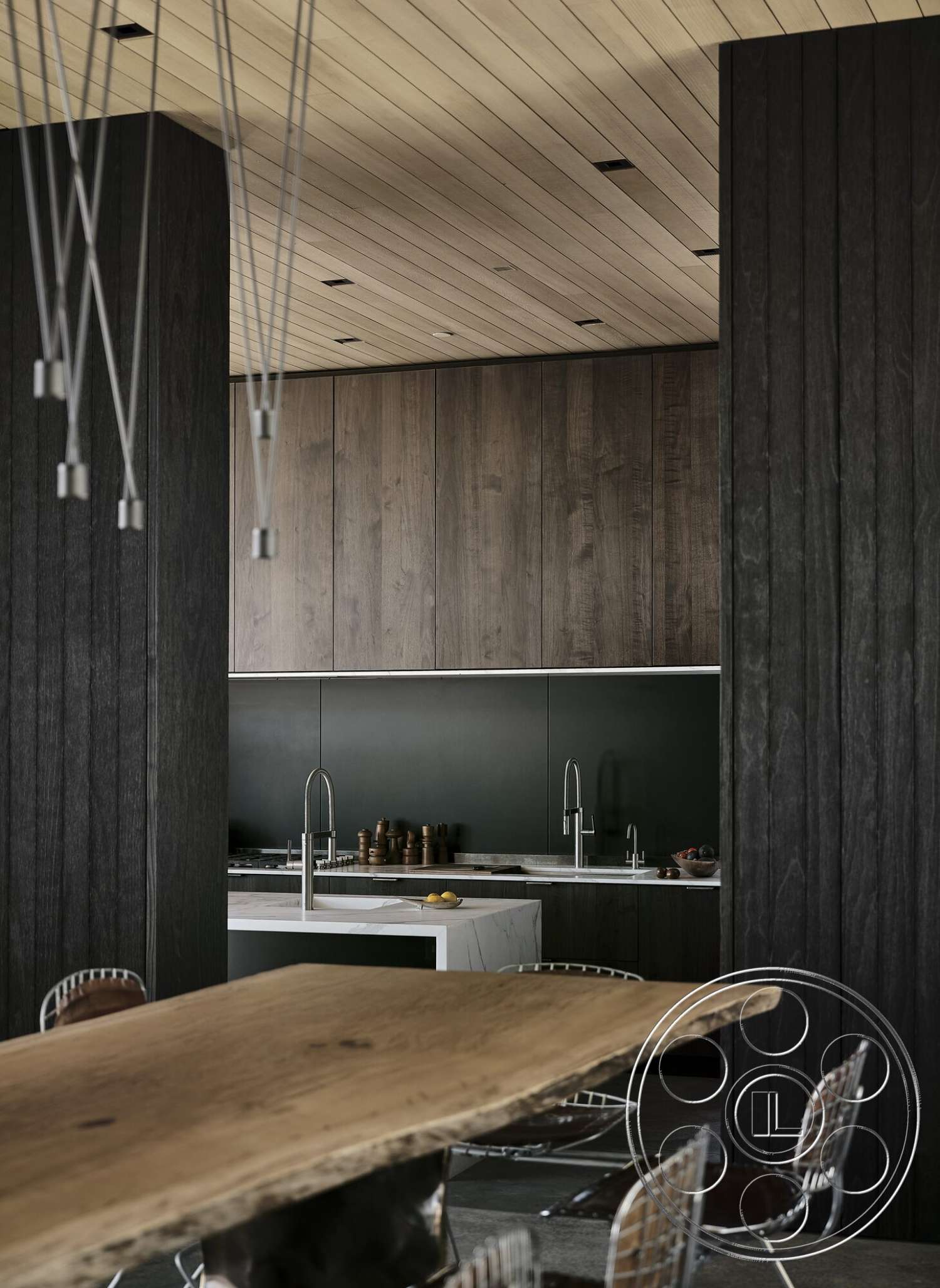 Palm Springs 110 - modern lighting fixtures, natural wood dining table, contemporary kitchen, metal dining chairs, open kitchen layout, marble kitchen island countertop, minimalist interior design, exposed wood ceiling panels, dark wood vertical wall treatments, black cabinetry in kitchen