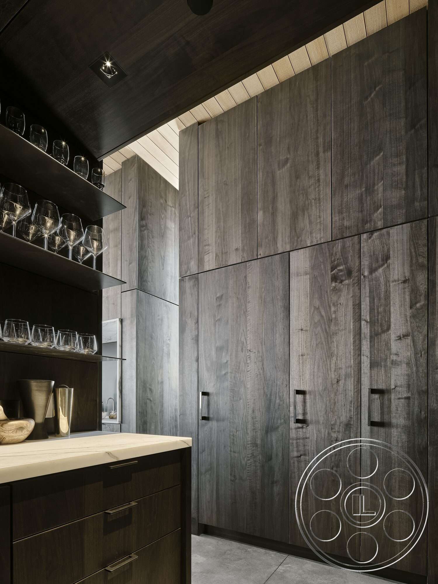 Palm Springs 110 - minimalist design, concrete flooring, dark wood paneling, oak cabinetry, recessed ceiling lights, built-in storage cabinets, metal drawer handles, slab countertop, etched glass shelving, planked wood ceiling