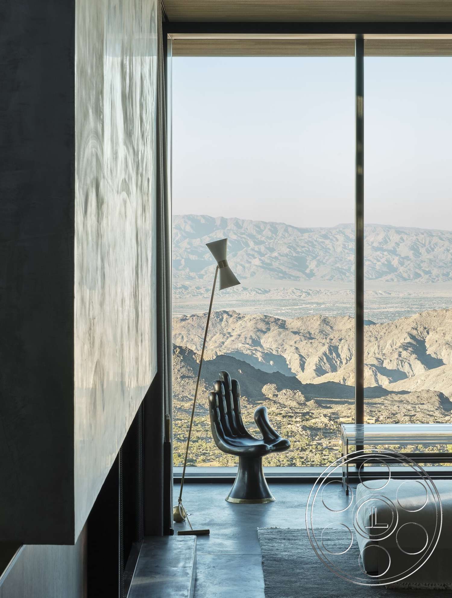 Palm Springs 110 - minimalist decor, polished concrete flooring, wood ceiling beams, mountain view setting, textured plaster wall, contemporary furniture design, glass floor-to-ceiling windows, modern accent chair