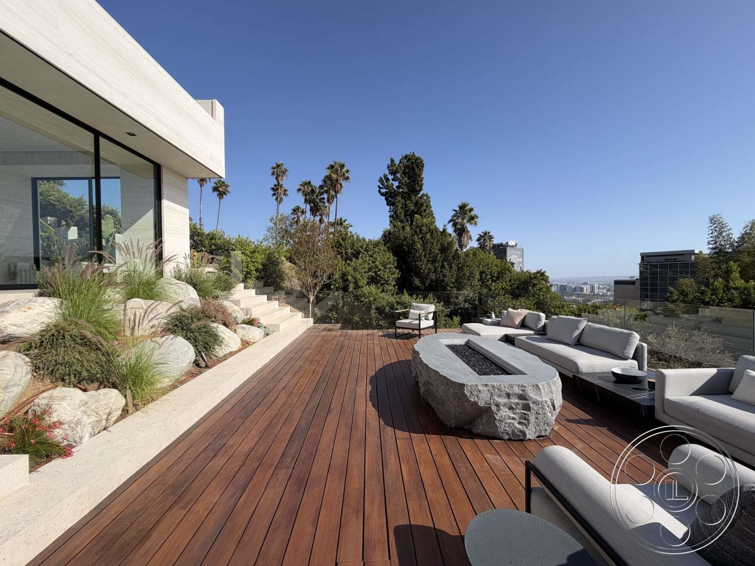 Modern 532 - exterior, landscaped garden, palm trees, glass railing, concrete steps, tropical landscaping, urban view, wood deck flooring, natural stone fire pit, modern house exterior, slate accent stones