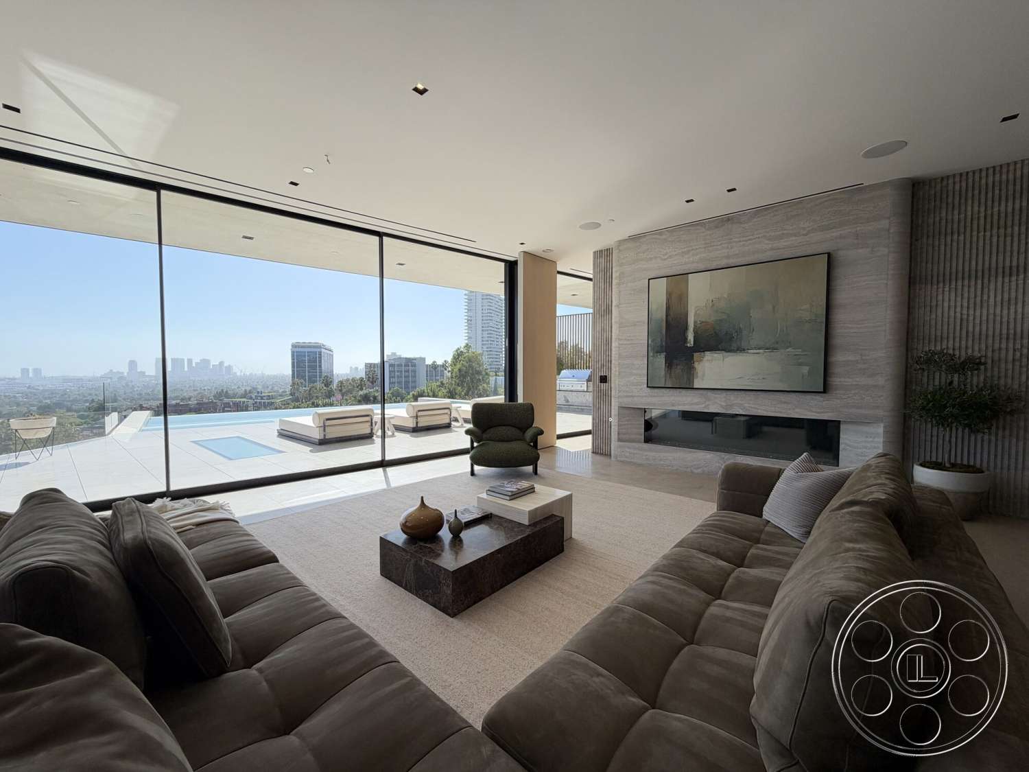 Modern 532 - neutral color palette, concrete flooring, city skyline view, comfortable sectional sofa, minimalist coffee table, reflective pool surface, poolside lounging area, modern interior design, floor-to-ceiling glass windows, textured stone feature wall, open floor plan living area, framed contemporary artwork, lounge area with outdoor view