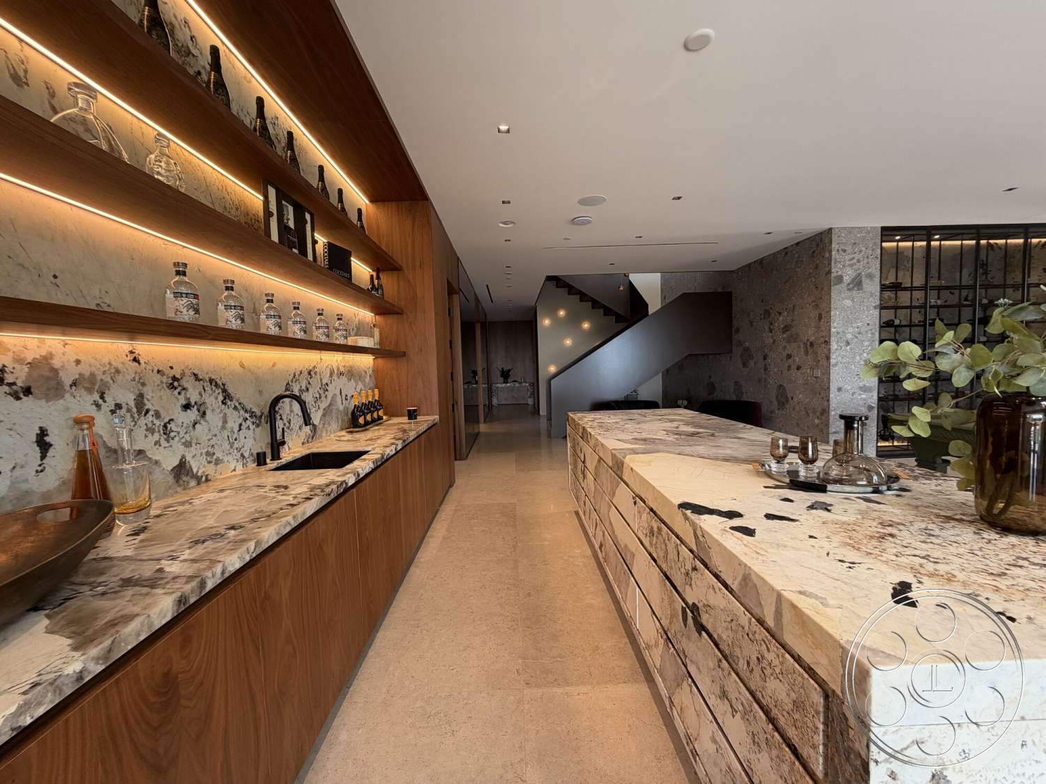 Modern 532 - neutral color palette, minimalist design, stone accent wall, open floor plan, wood cabinetry, polished concrete flooring, ambient lighting, built-in shelving, modern staircase, marble kitchen countertop, exposed lighting fixtures, black steel railing, rectangular shape, textured stone elements