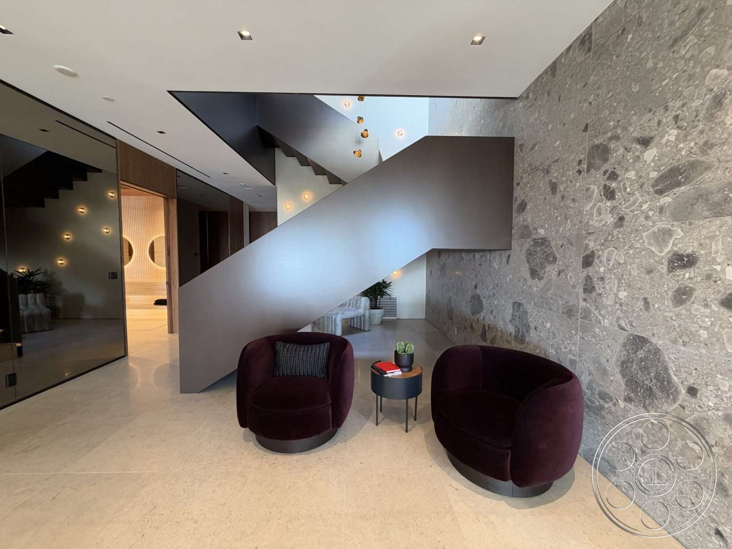 Modern 532 - wood paneling, modern light fixtures, glass partition, built-in shelves, polished stone flooring, floating staircase, minimalist architectural style, concrete feature wall, open foyer design, curved modern chairs, accent plant decor