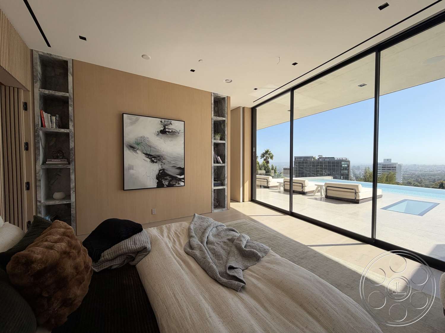 Modern 532 - open concept layout, textured plaster walls, decorative framed artwork, concrete patio flooring, modern minimalist design, rectangular infinity pool, wood shelving units, large floor-to-ceiling glass windows, luxurious bedroom setting, neutral beige wall treatment, landscape city skyline view
