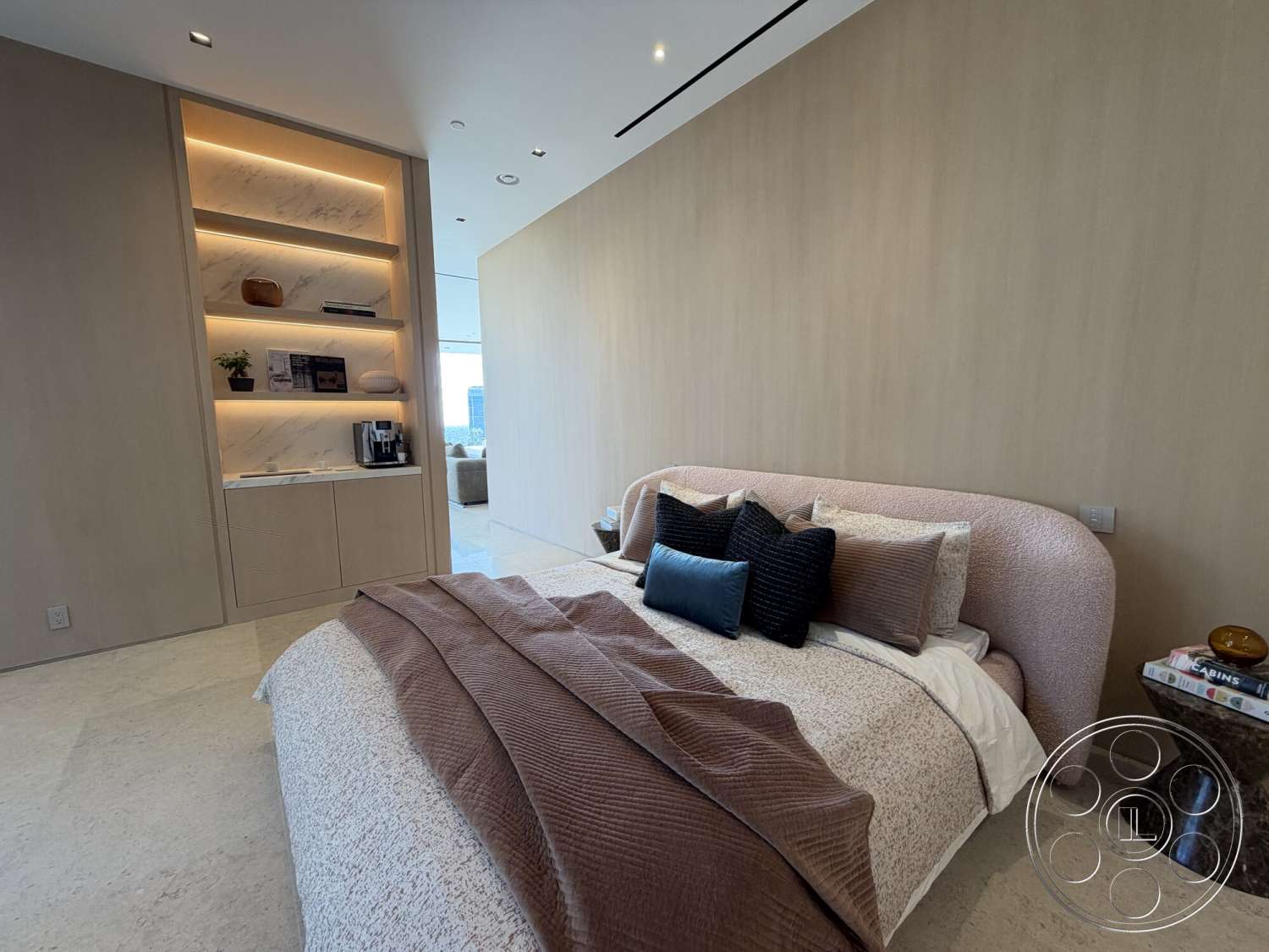 Modern 532 - minimalist design elements, textured stone flooring, contemporary aesthetic, cozy reading nook, neutral color scheme, recessed ceiling lights, large window with city view, soft bedding with decorative pillows, decorative side table, upholstered bed frame, smooth wood paneling walls, built-in shelving with marble accents